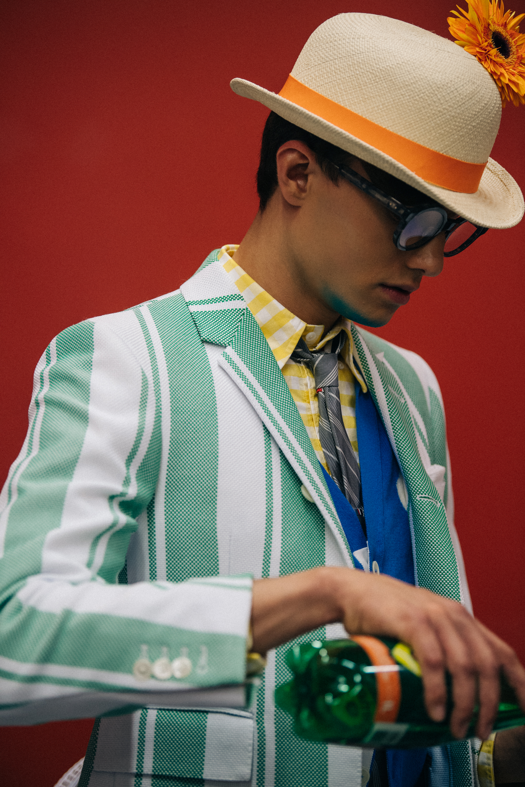 Model wearing green suit jacket