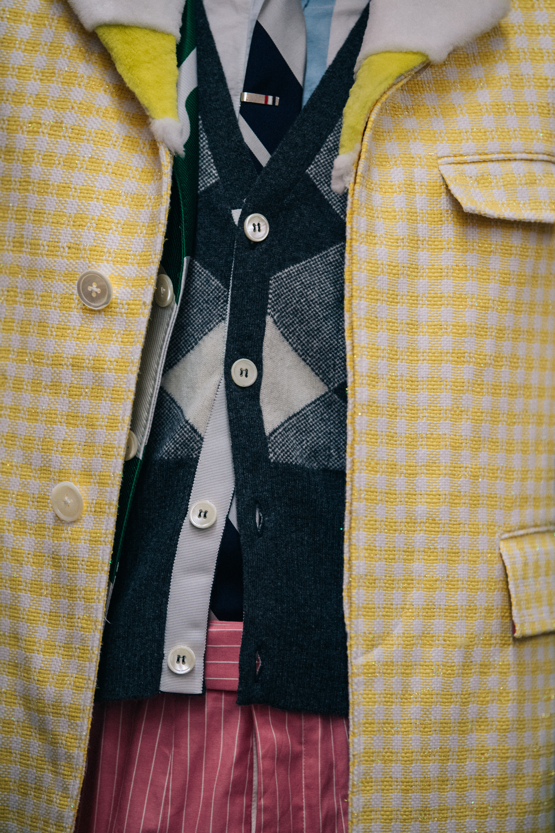Models wearing yellow Thom Browne outfit