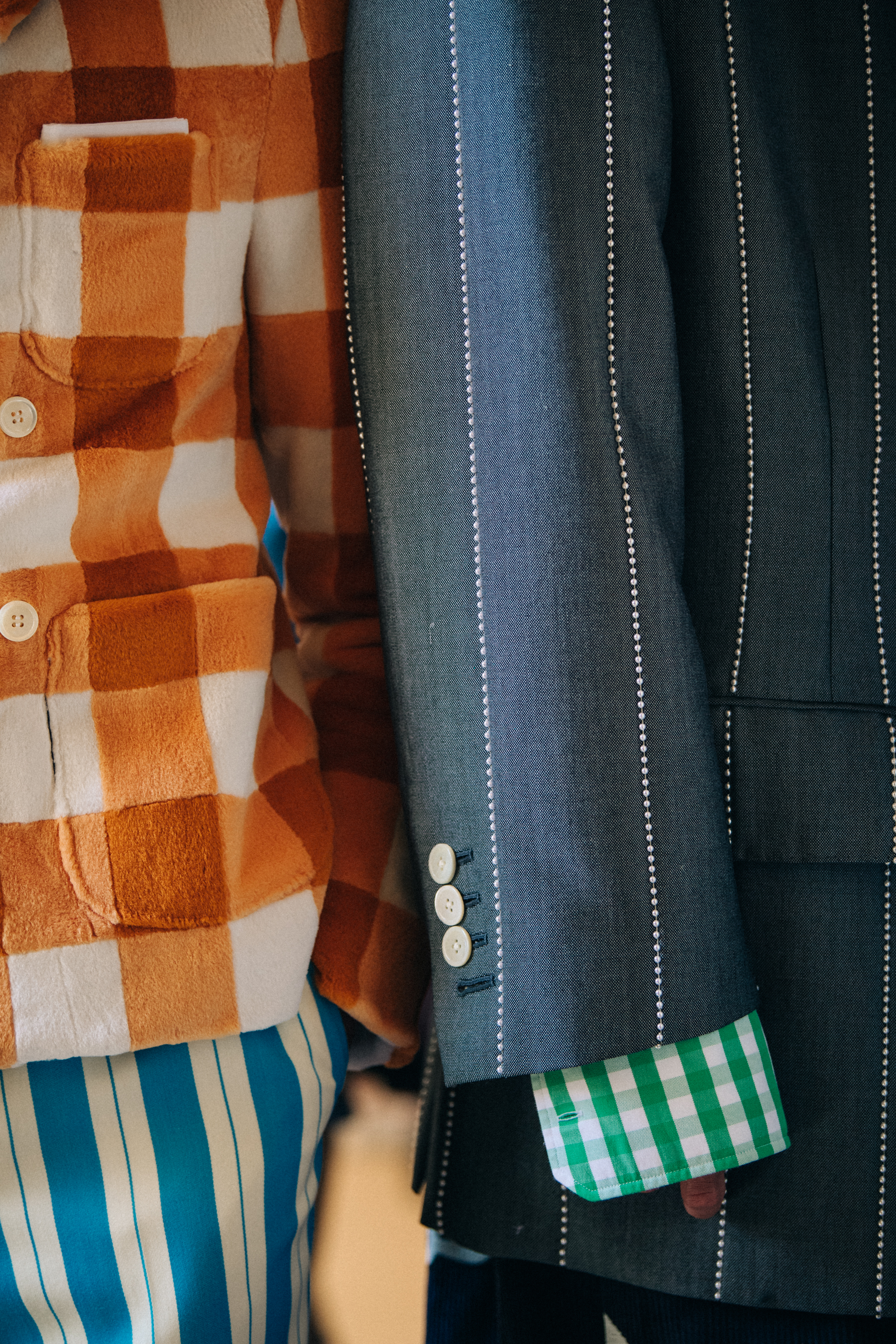 Model wearing colourful check at Thom Browne