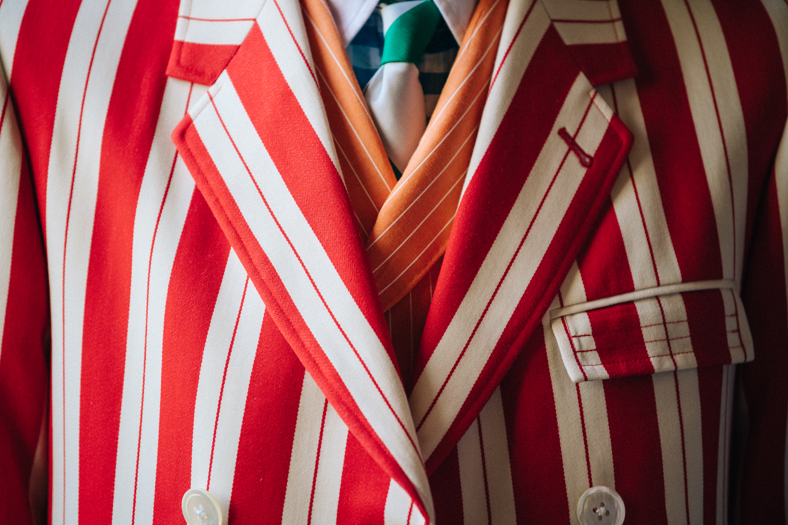 Model wearing red at Thom Browne