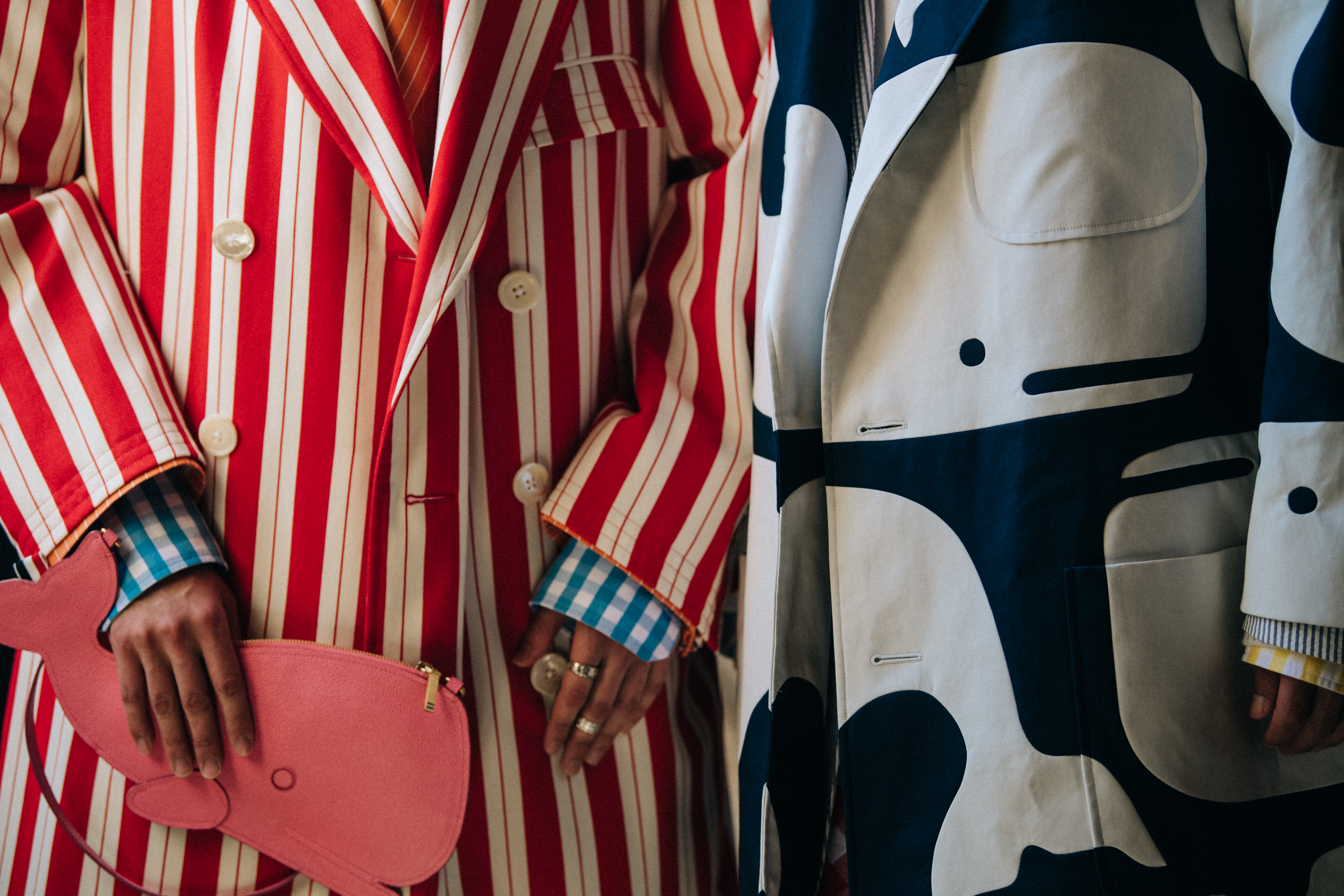 Models wearing red and blue suits