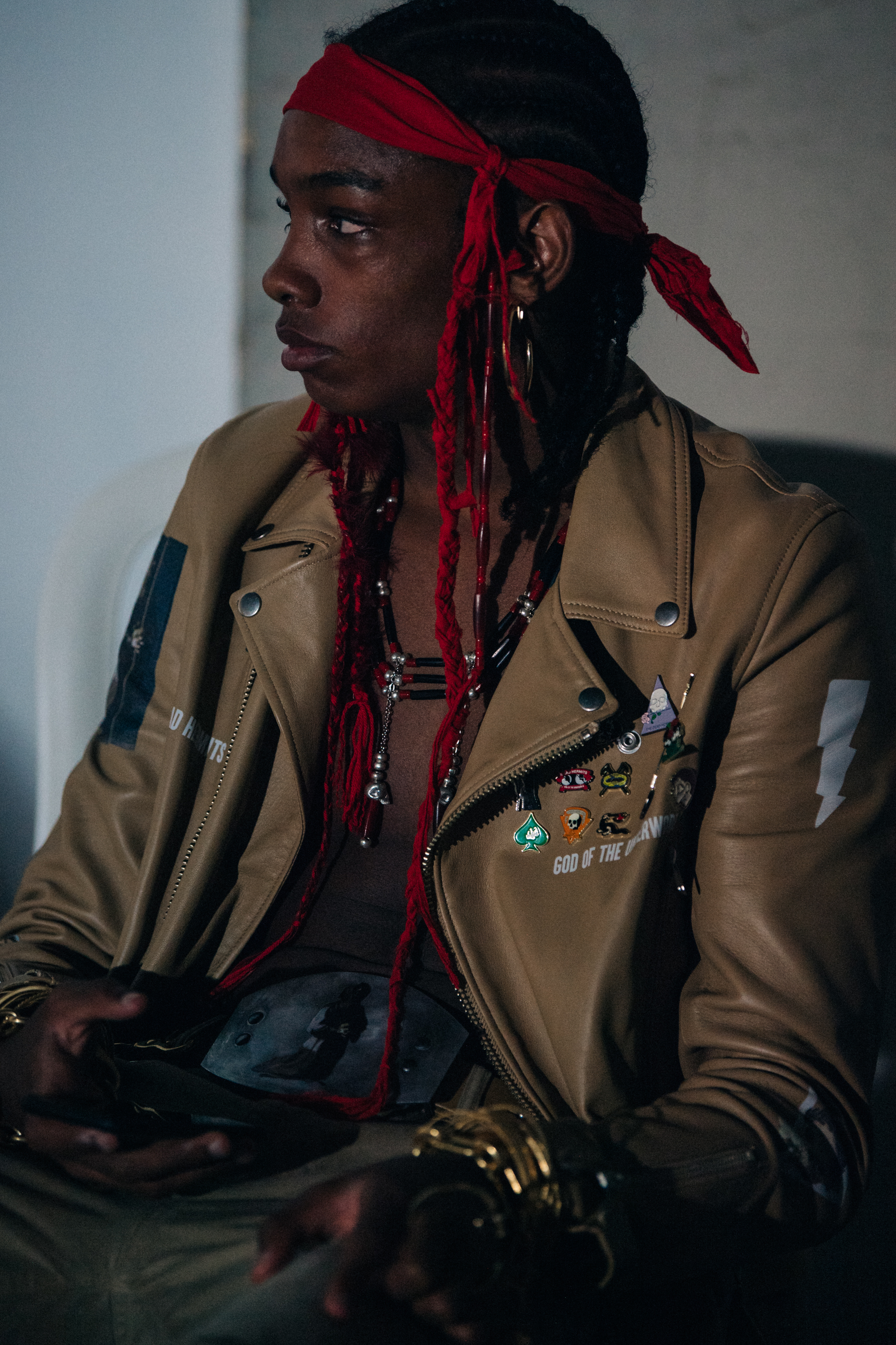 Model wearing red bandana backstage