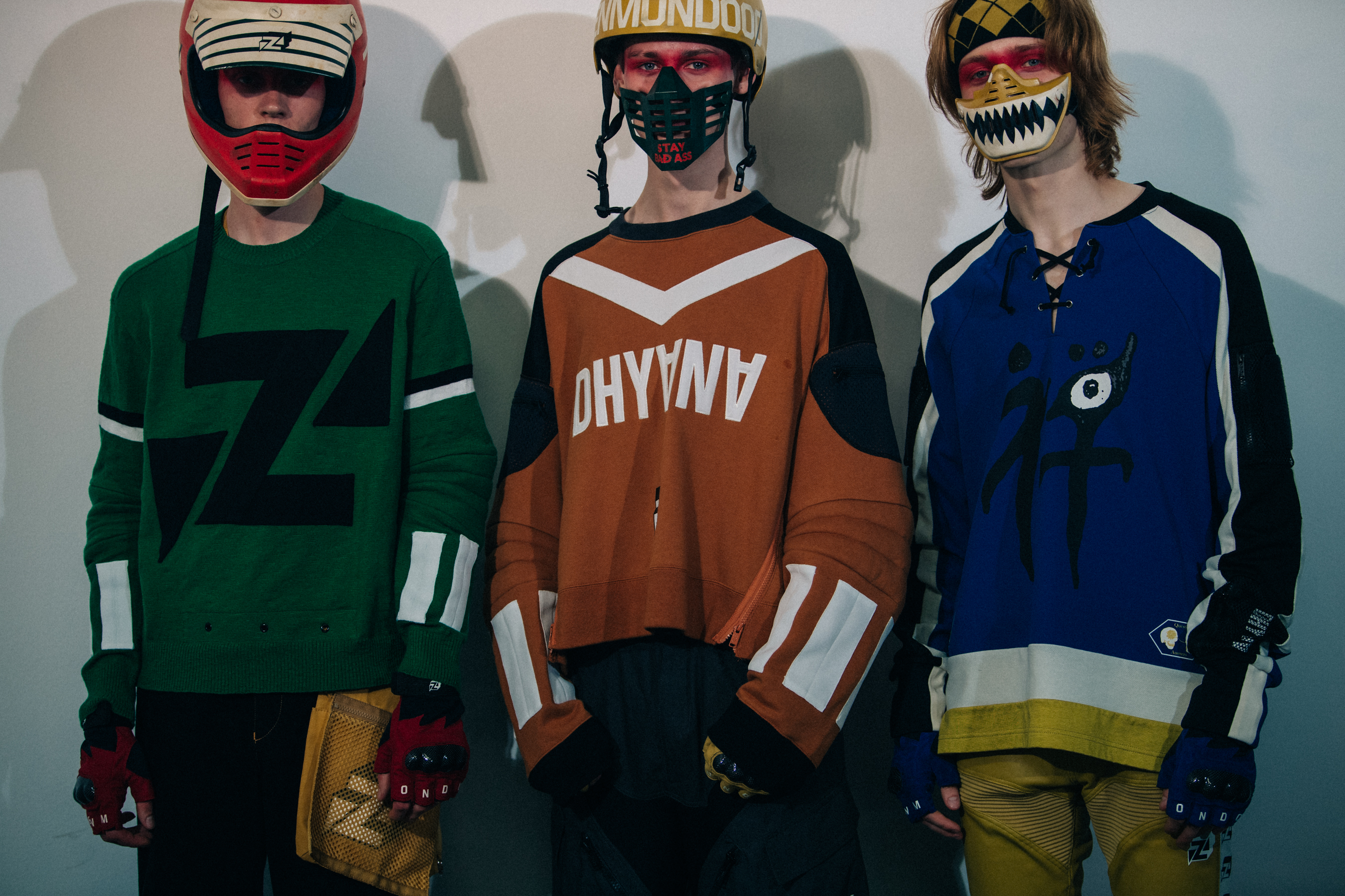 Models wearing motorcross outfits