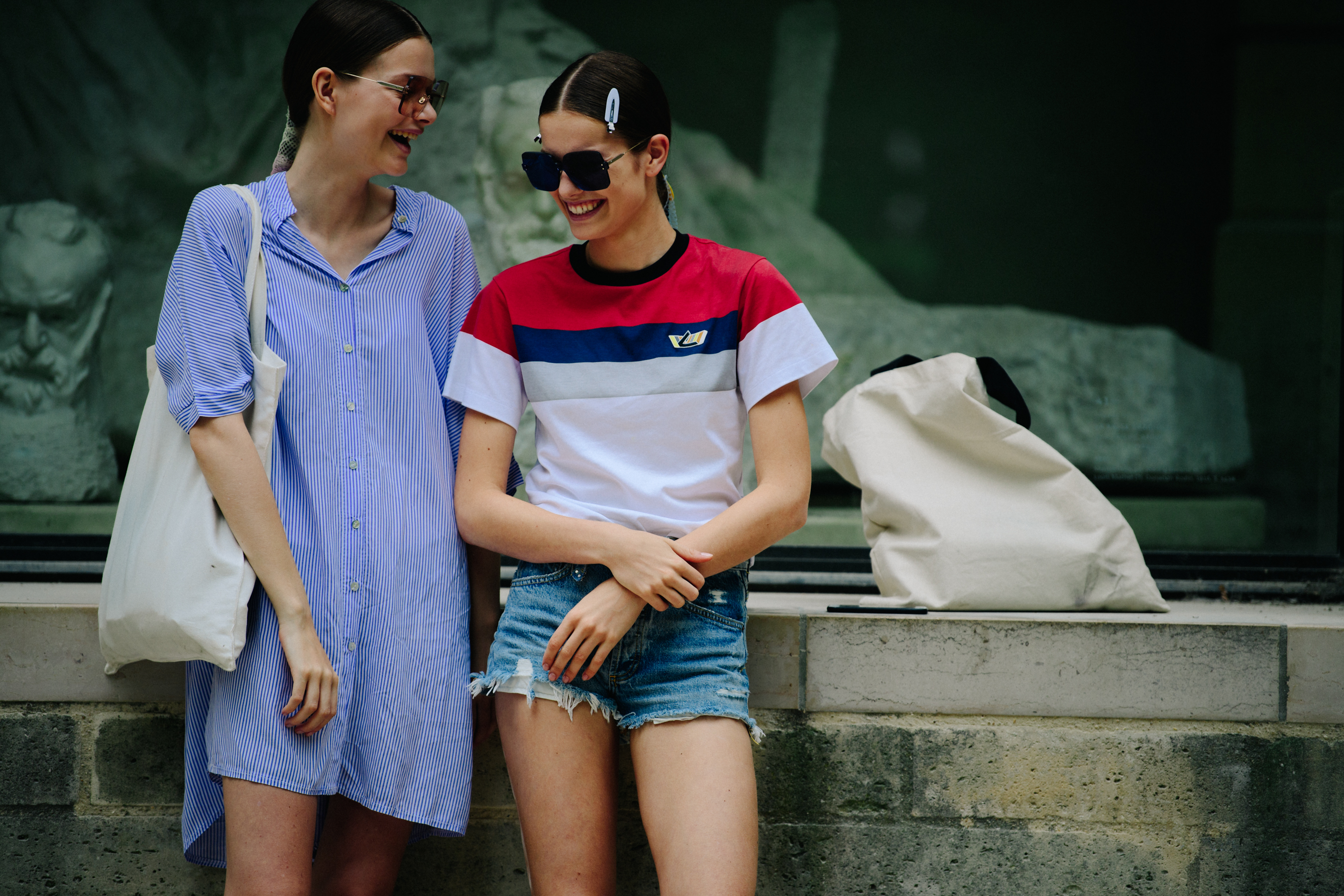 Two models wearing Christian Dior glasses