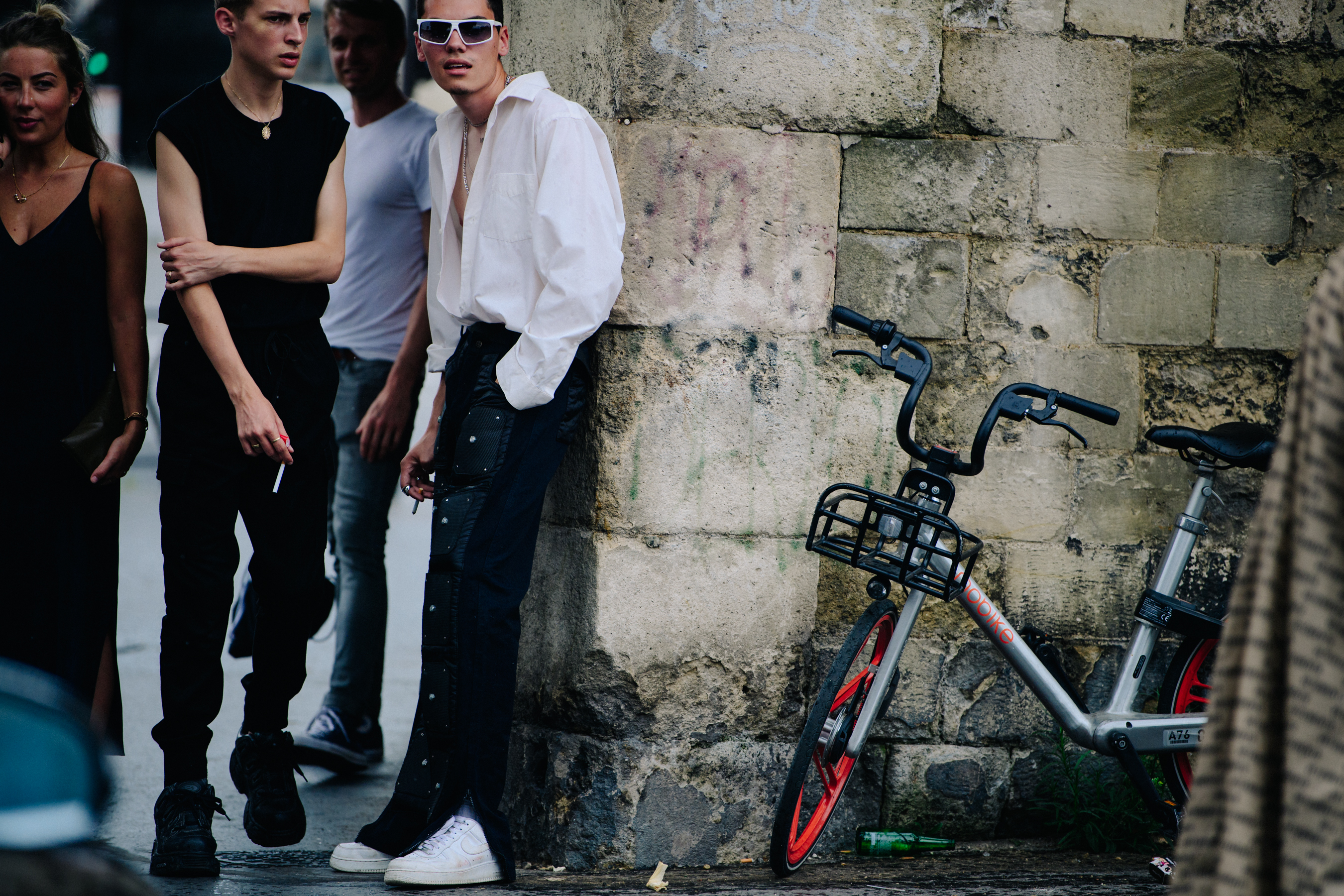 Man wearing white sunglasses
