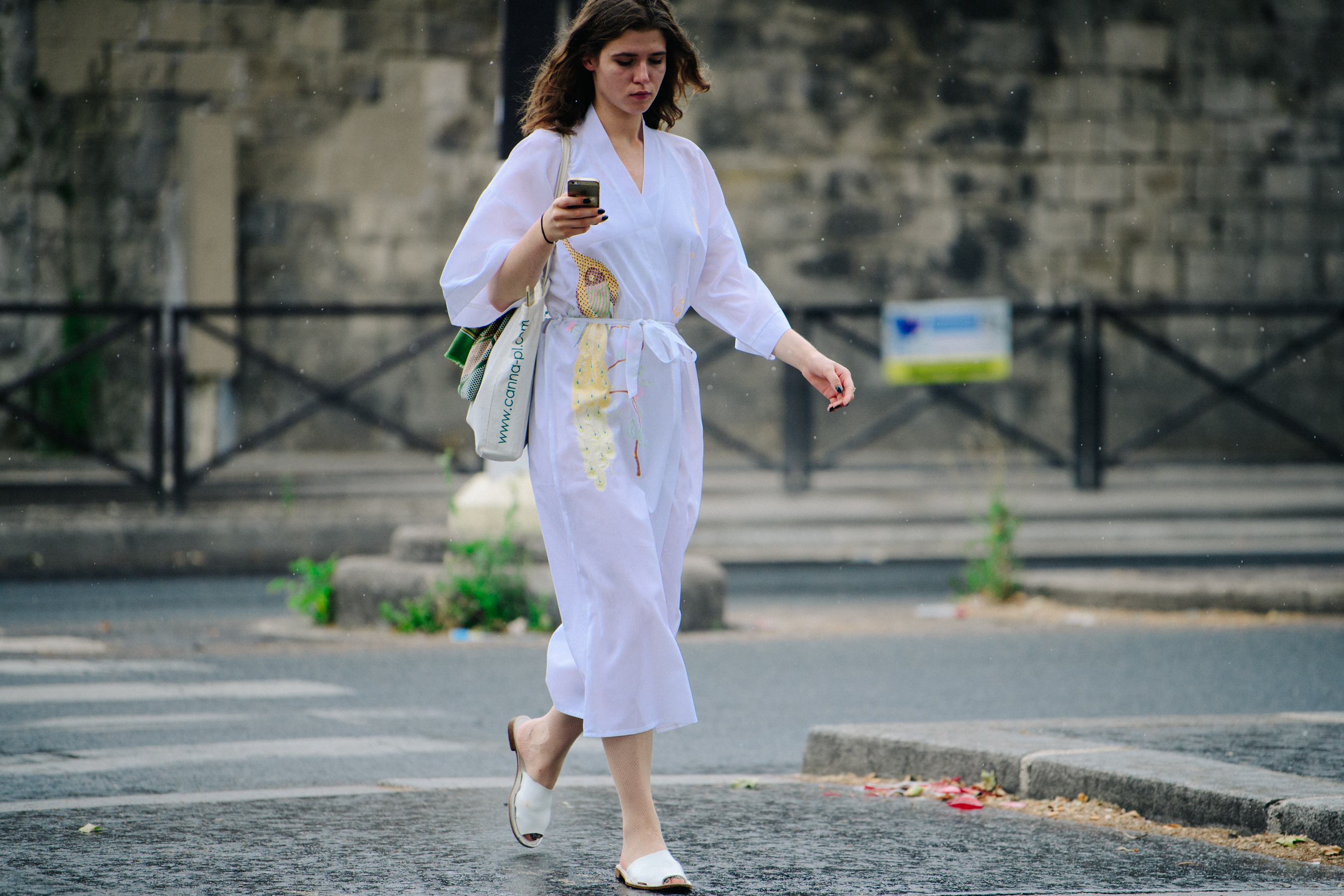 Woman wearing white coat