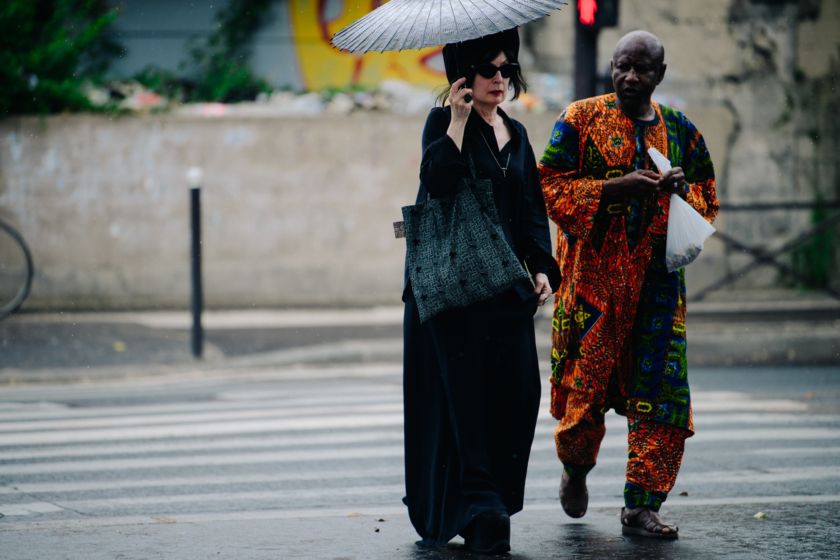 Couple wearing dark outfits