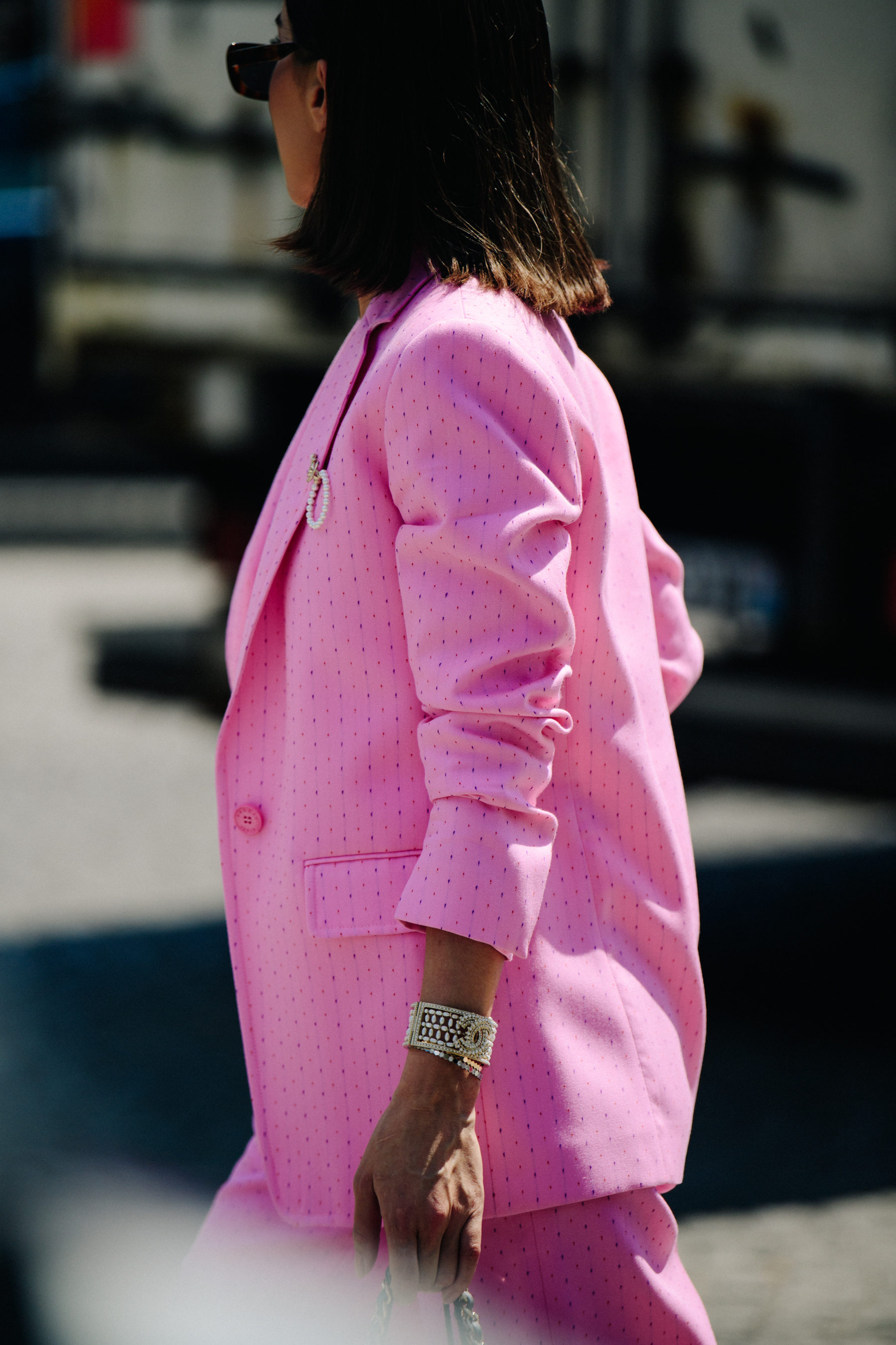 Woman wearing pink Chanel suit