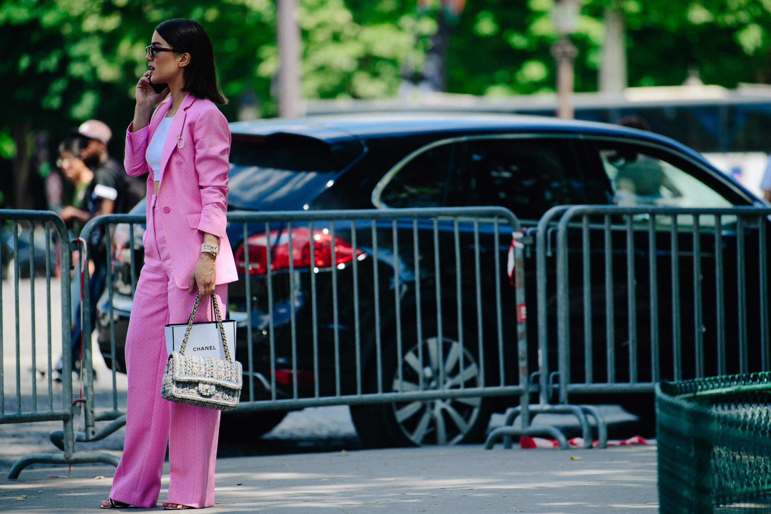 Woman wearing pink Chanel suit