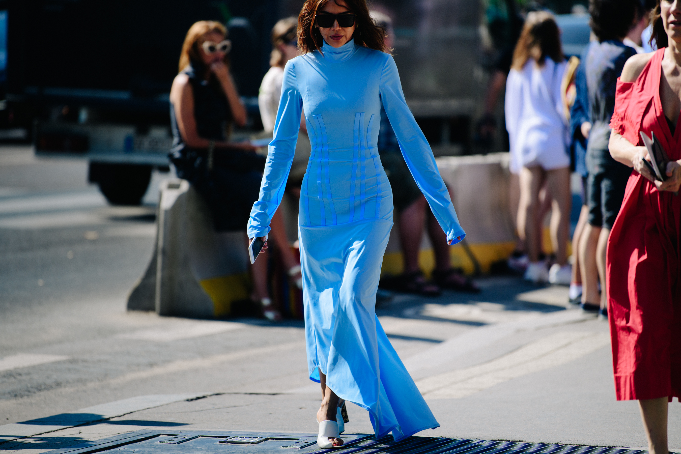 Woman wearing long blue dress