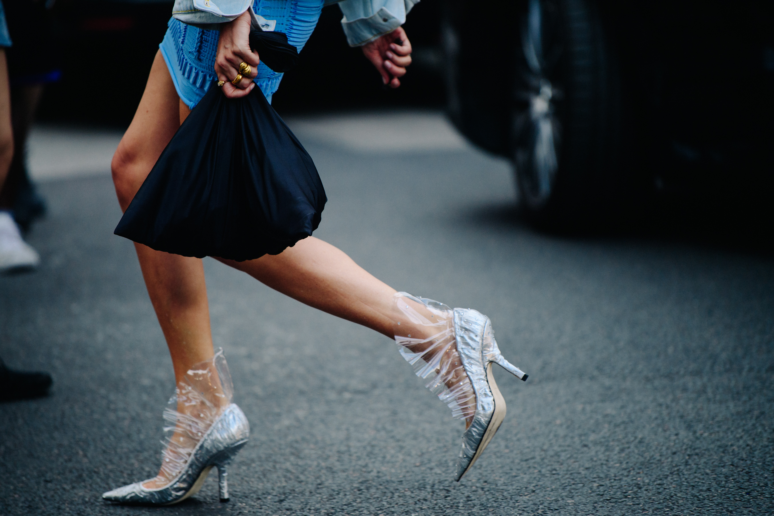 Woman wearing plastic heels