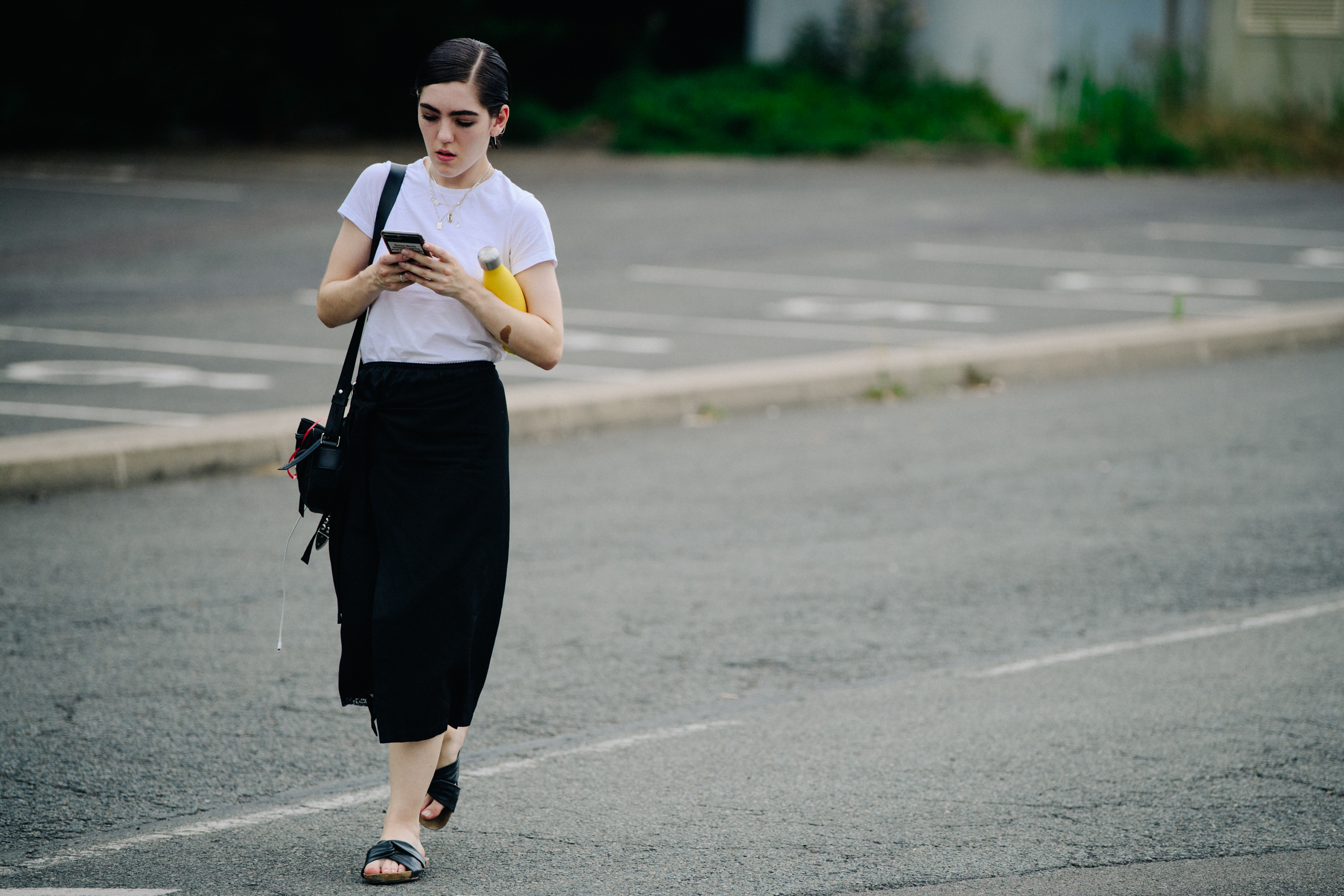 Woman wearing white and black