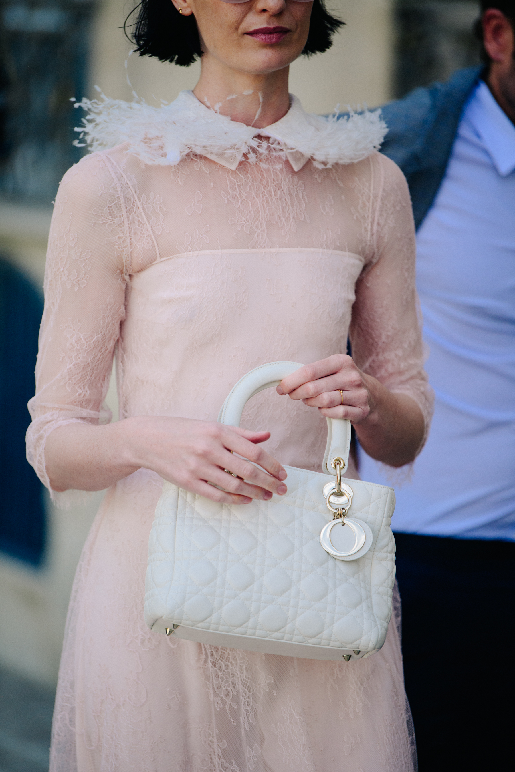 Woman wearing long pink Christian Dior outfit