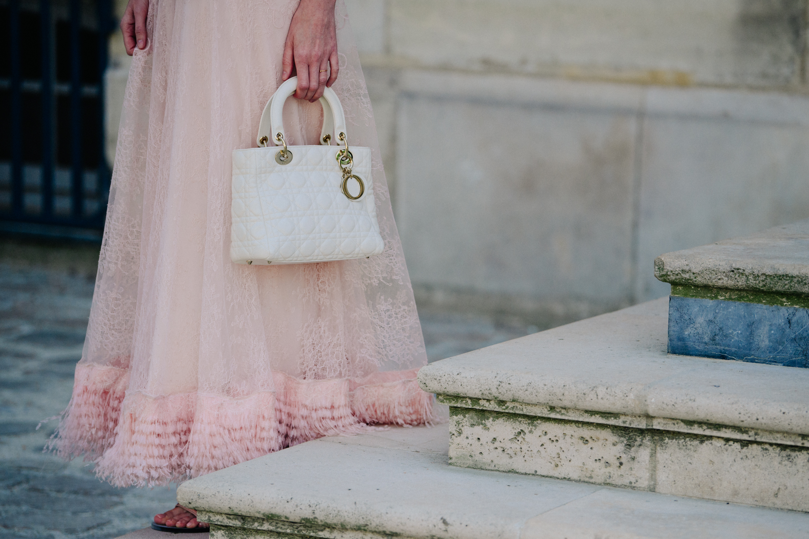 Woman wearing long pink Christian Dior outfit