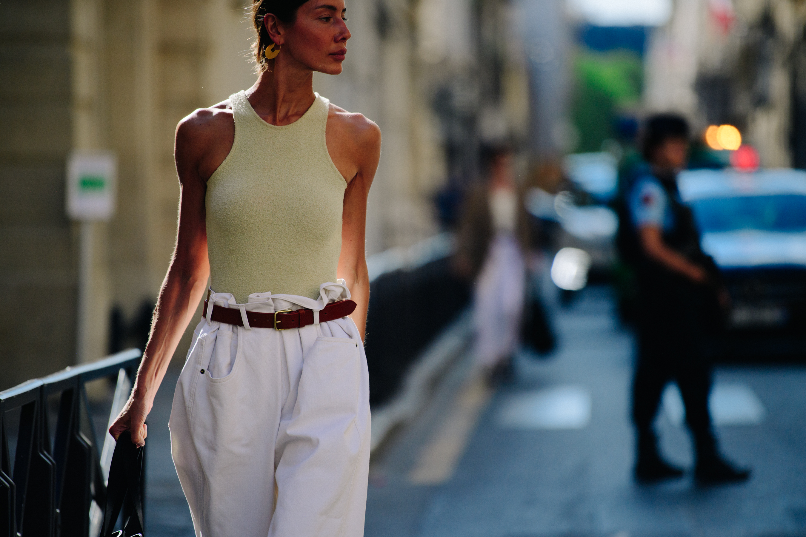 Woman wearing wide white pants