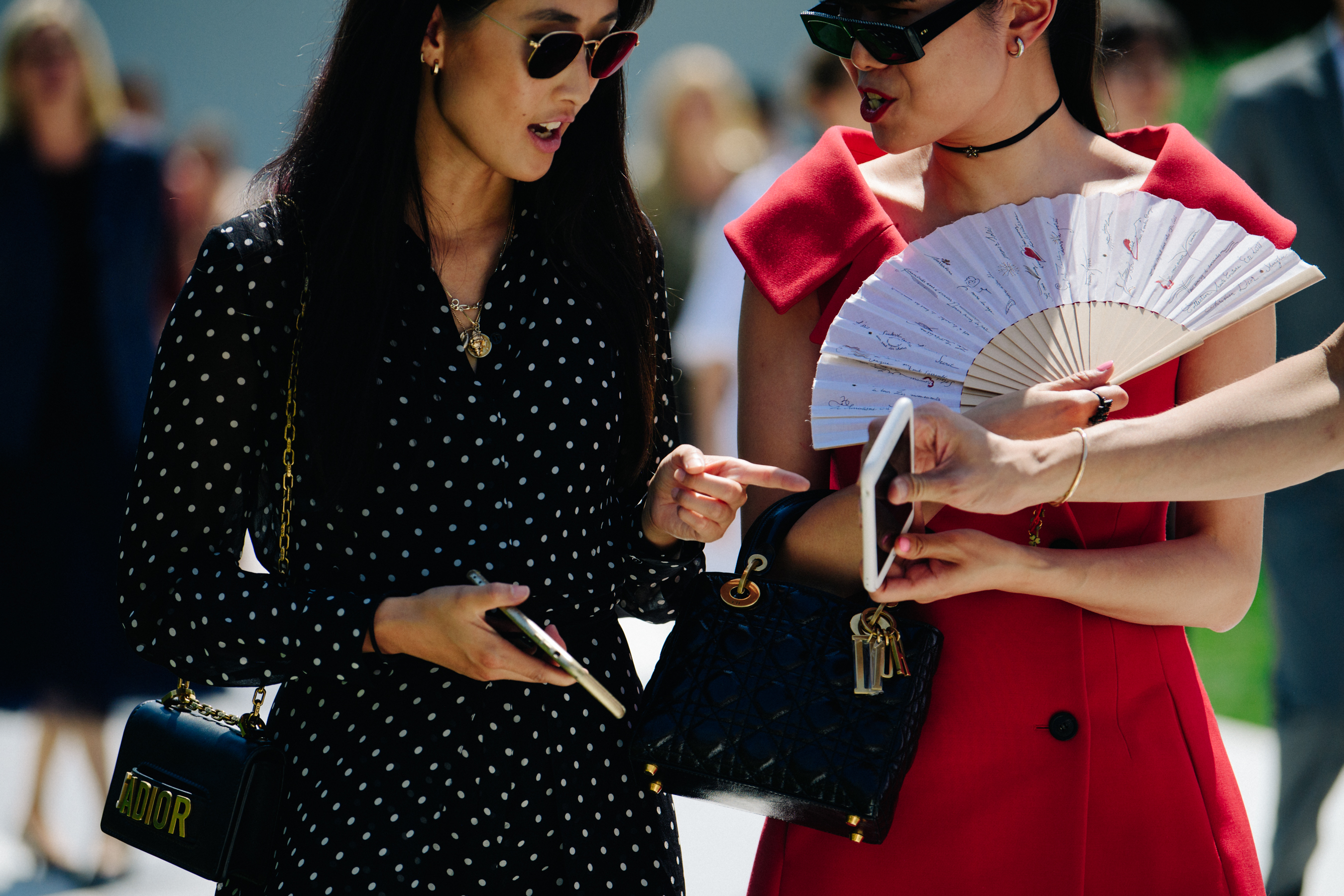 Two Asian bloggers wearing dresses