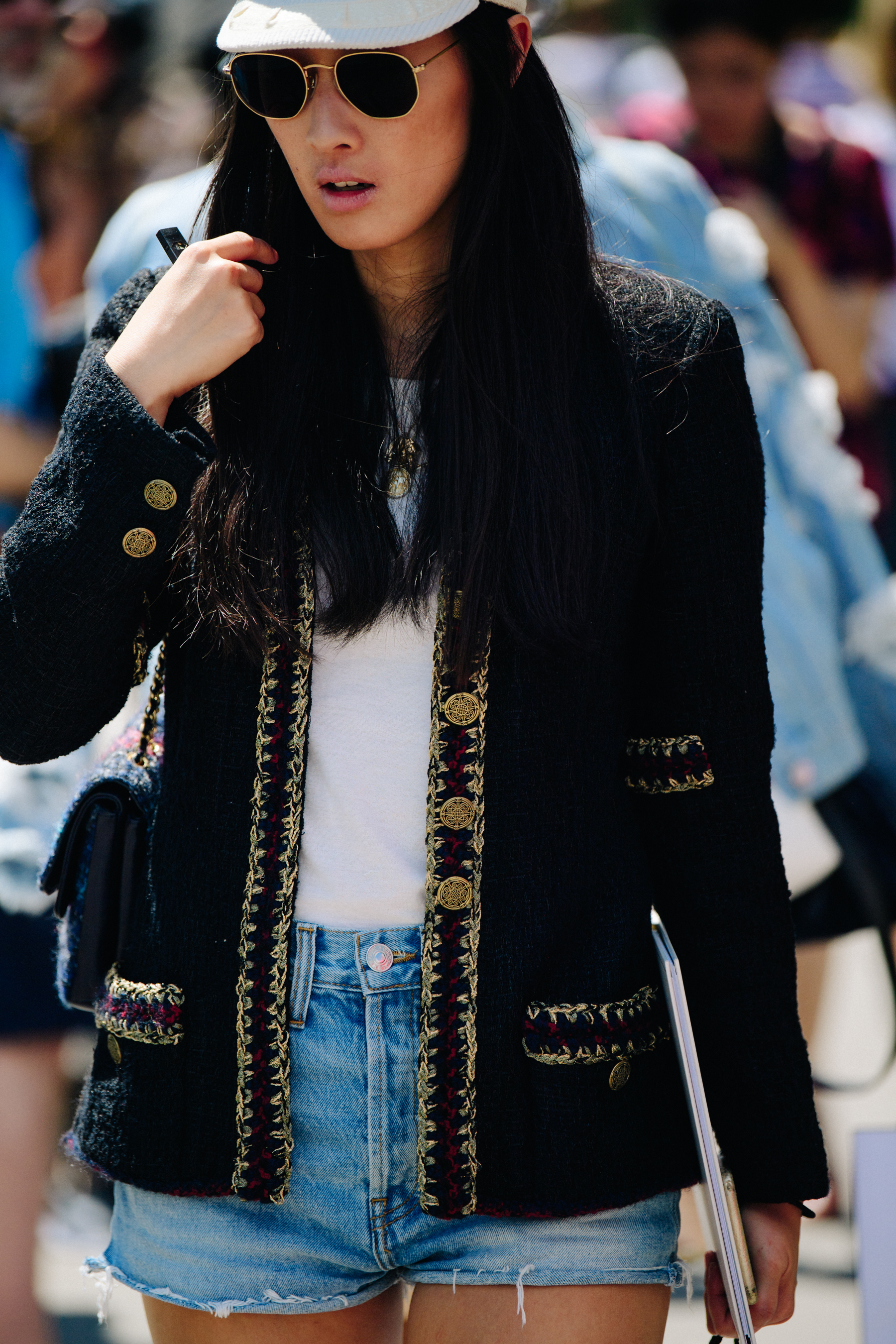 Woman wearing Chanel jacket