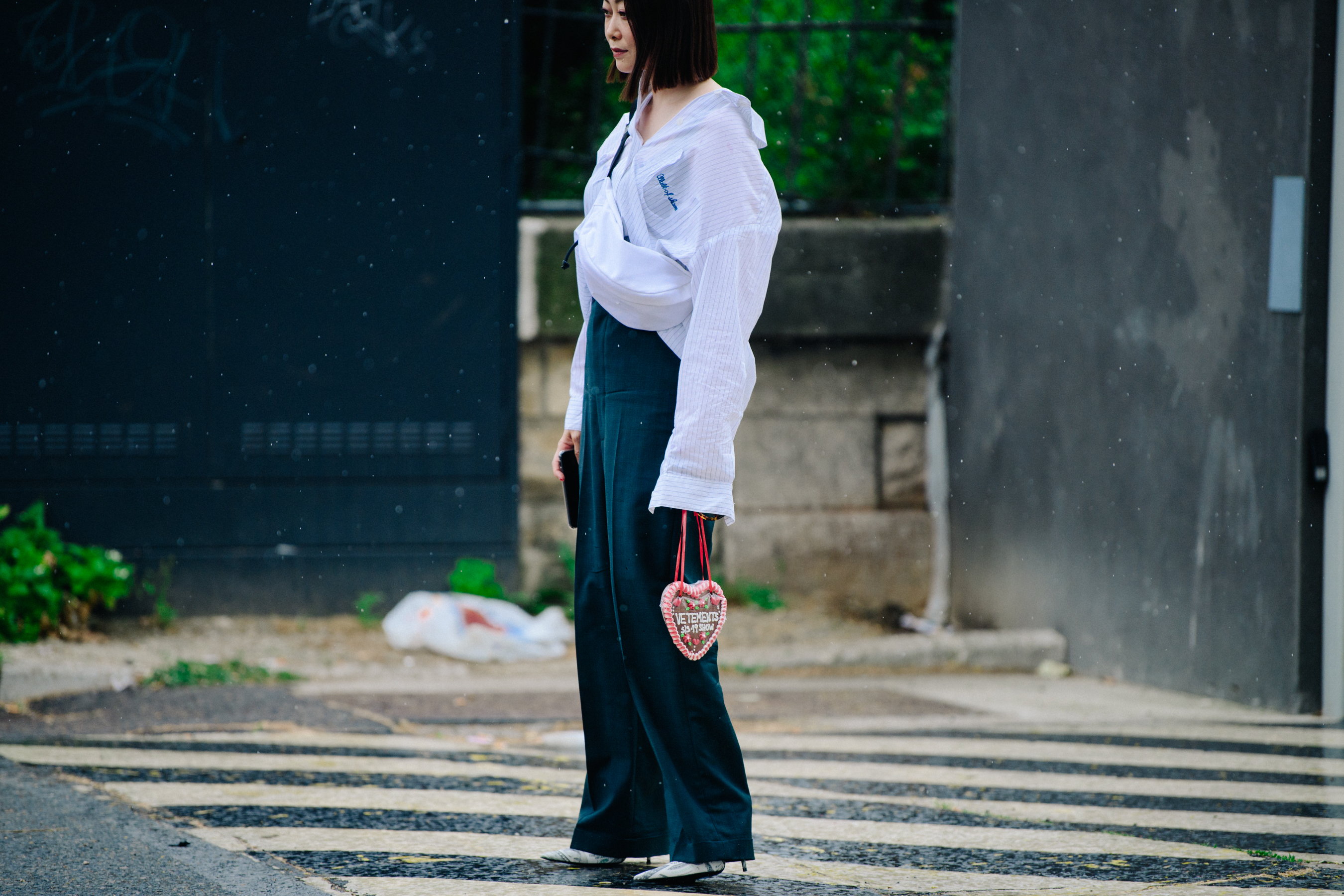 Woman wearing white striped shirt