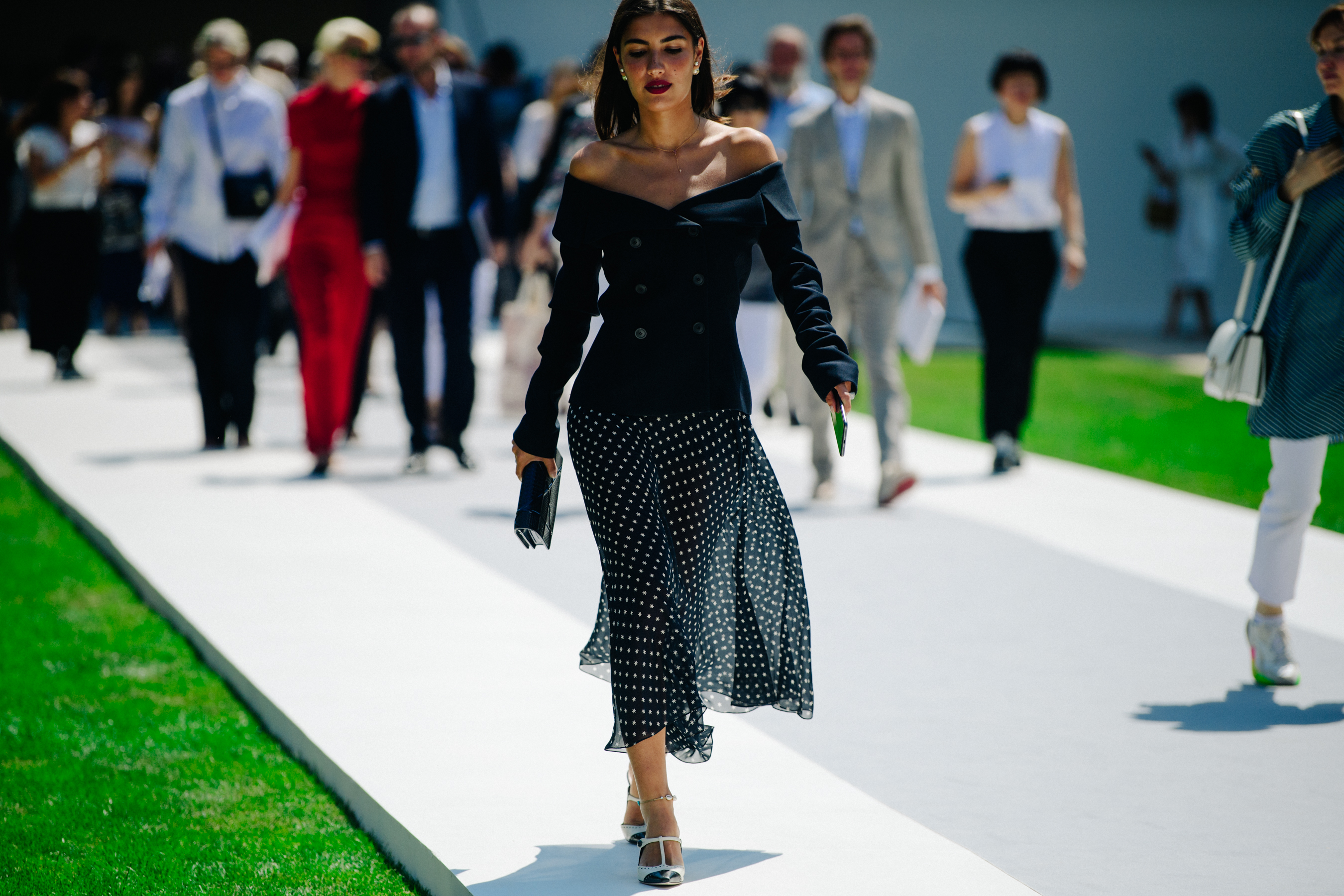 Italian blogger wearing dark jacket