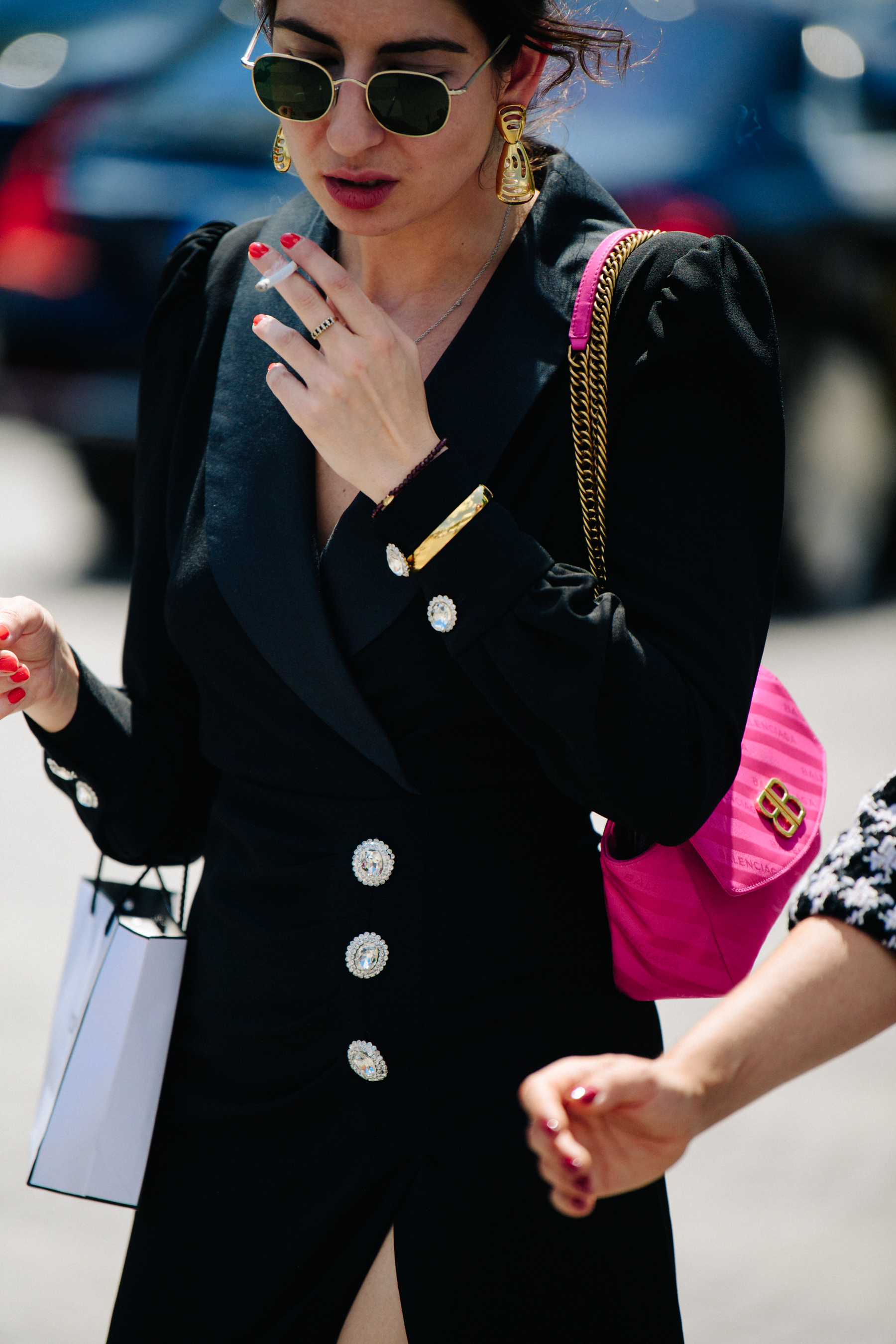 Woman wearing Balenciaga bag
