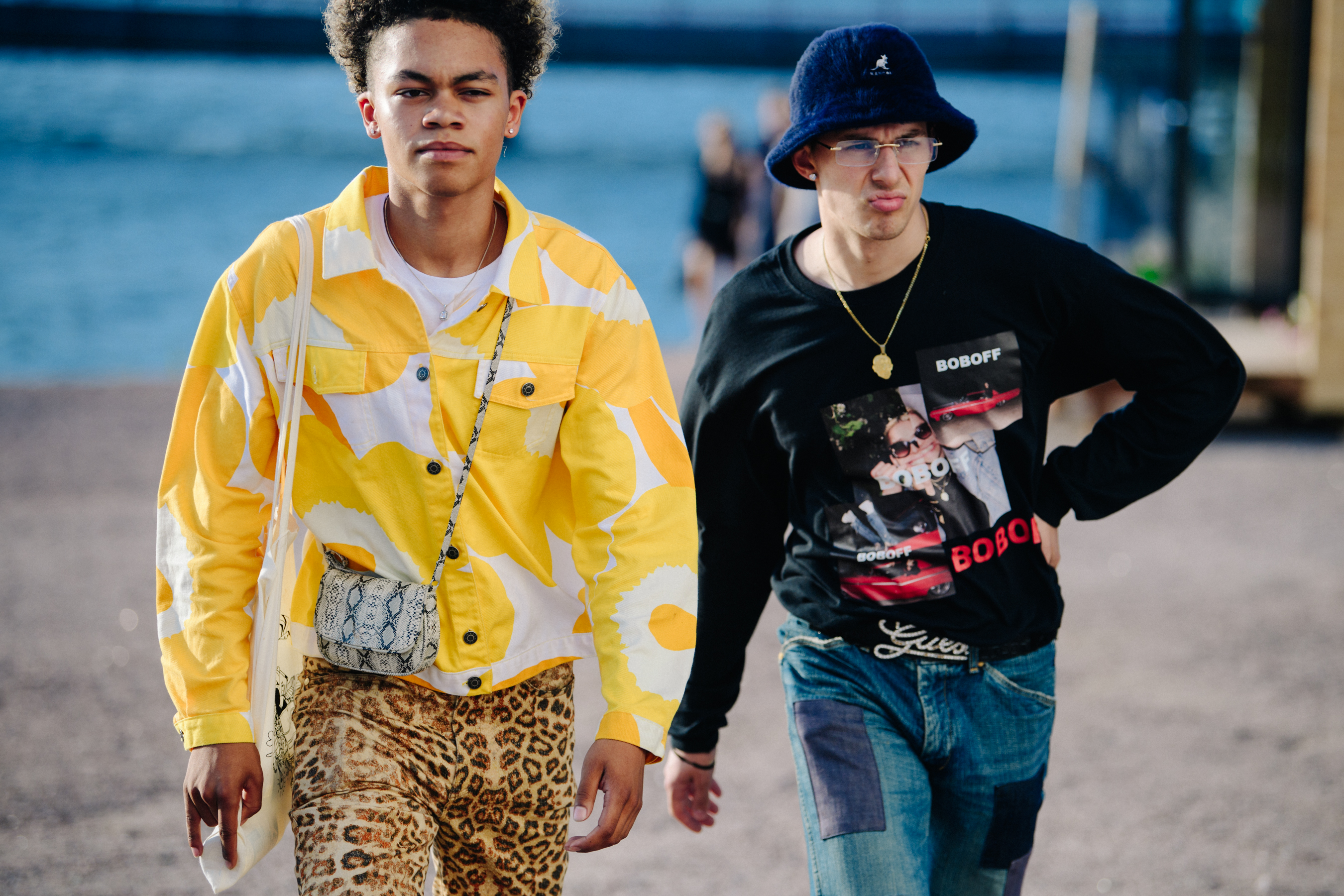 Two men wearing colourful clothing