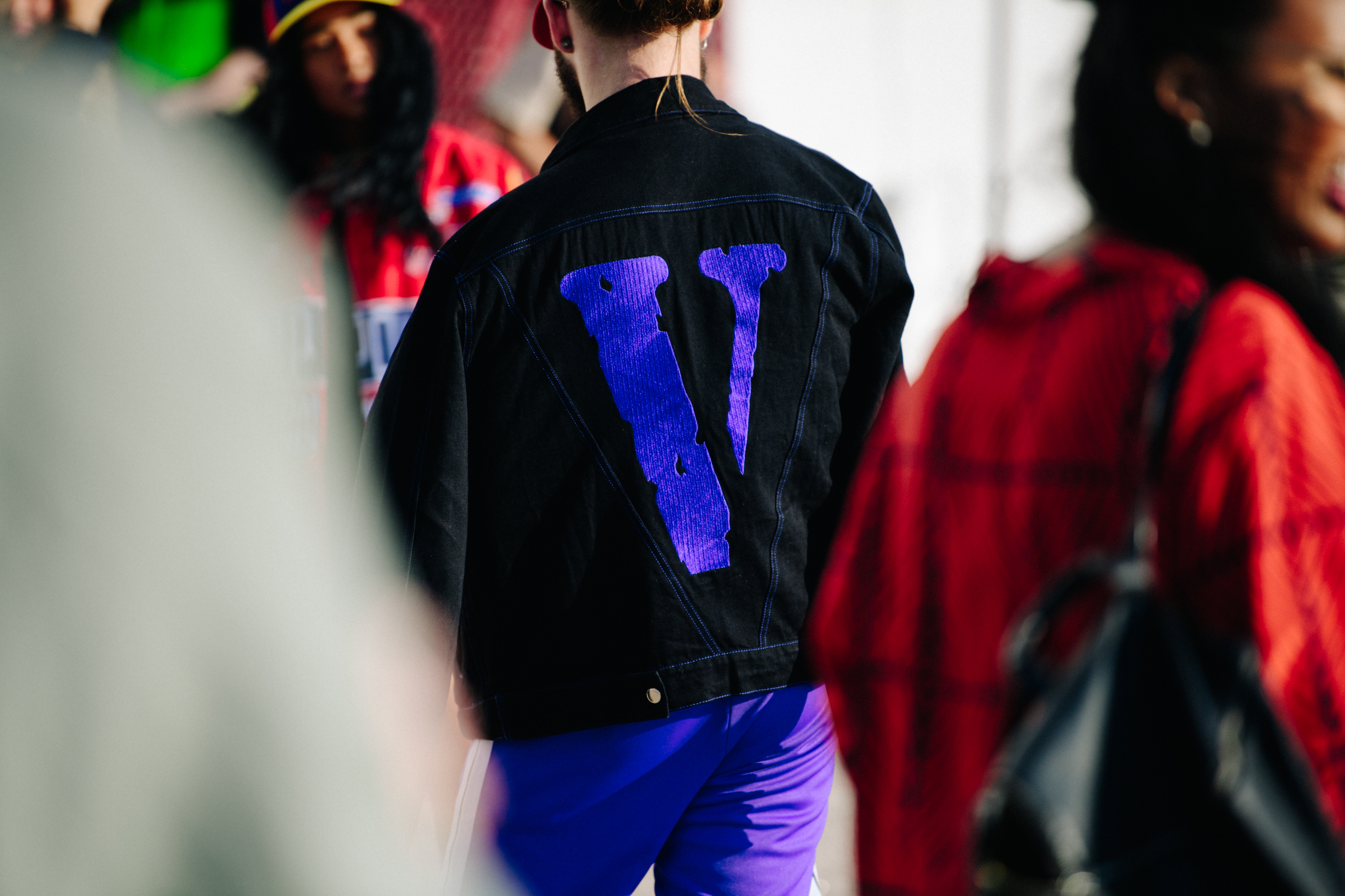 Woman wearing dark denim jacket