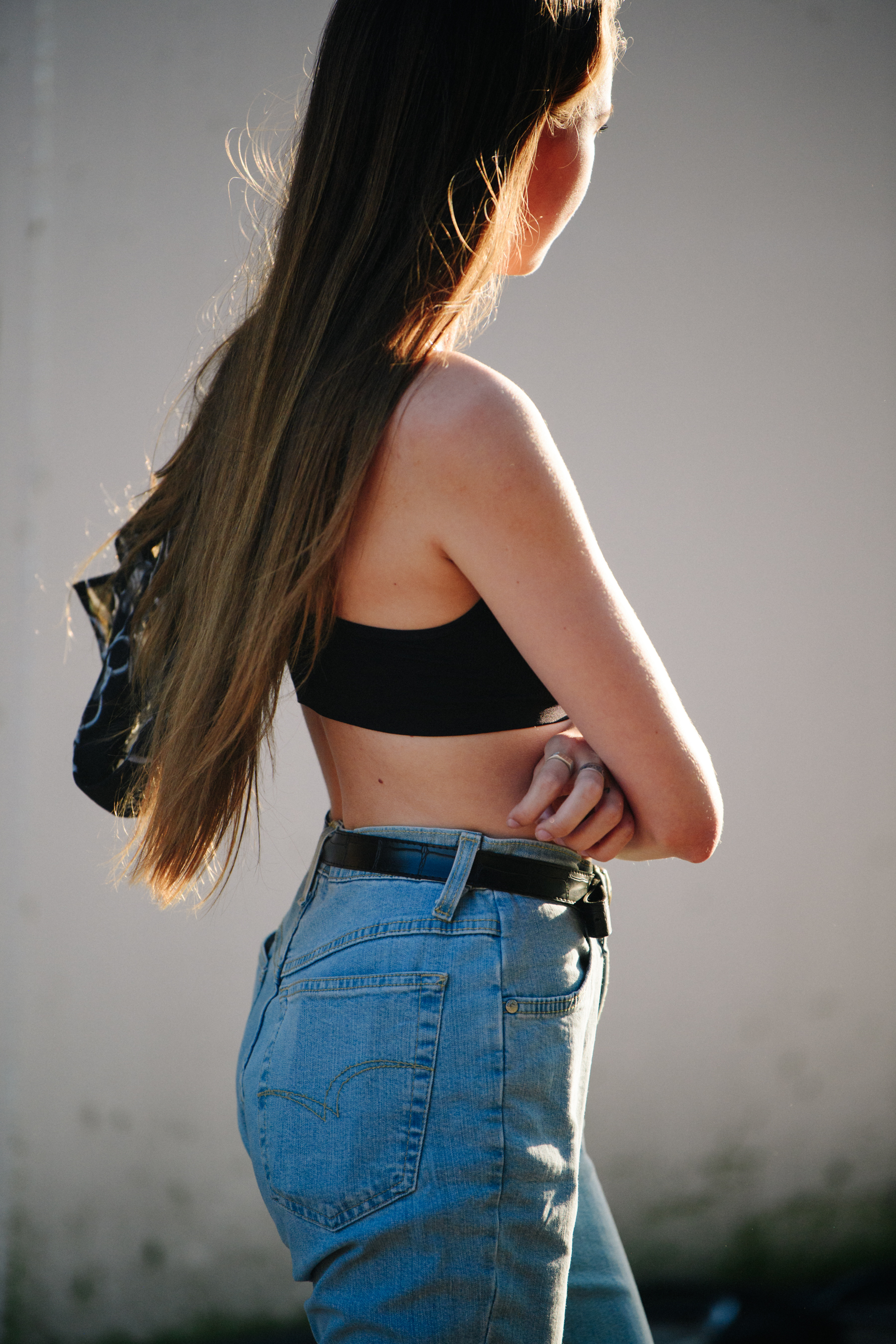 Model wearing dark sports bra