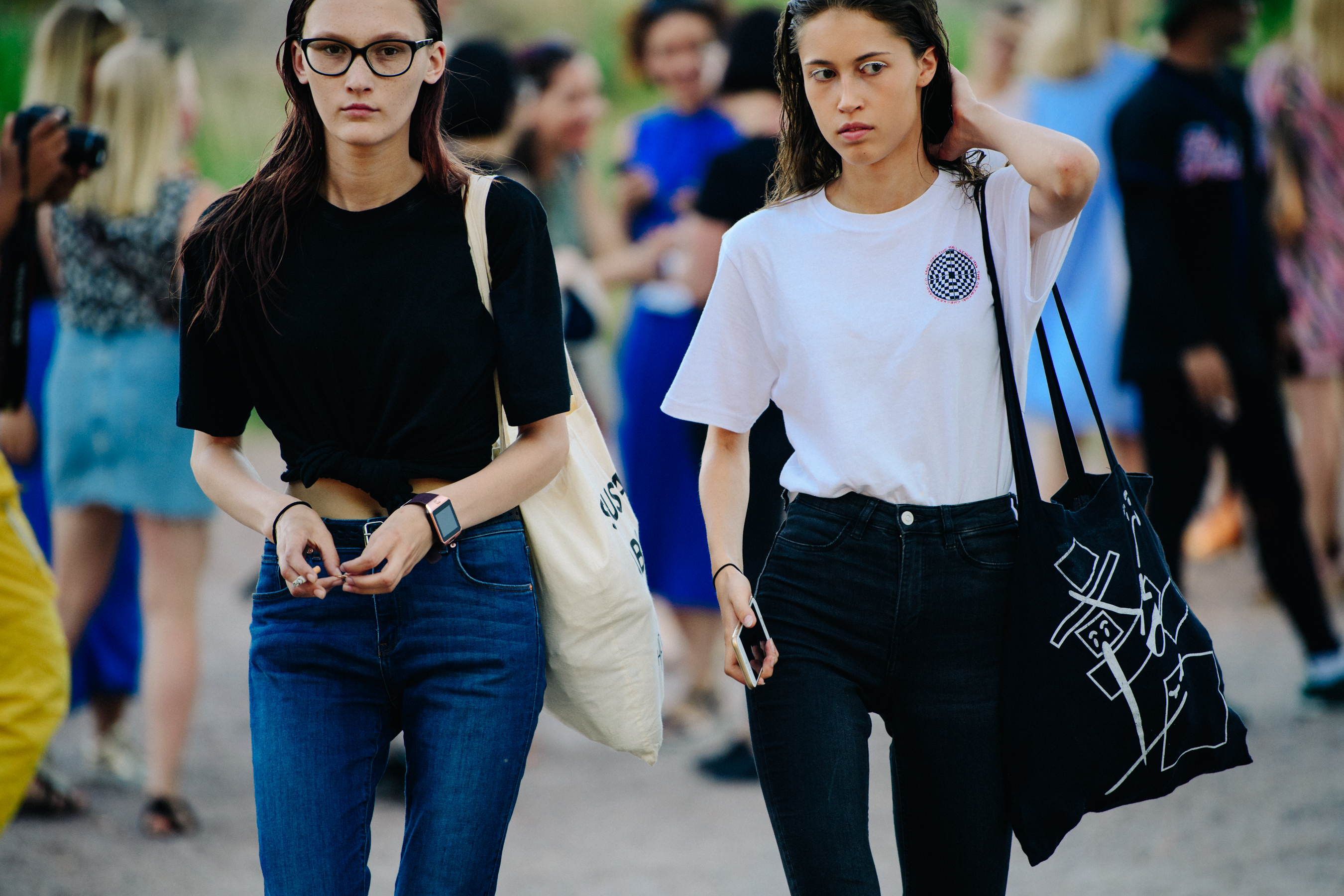 Two models wearing black and white