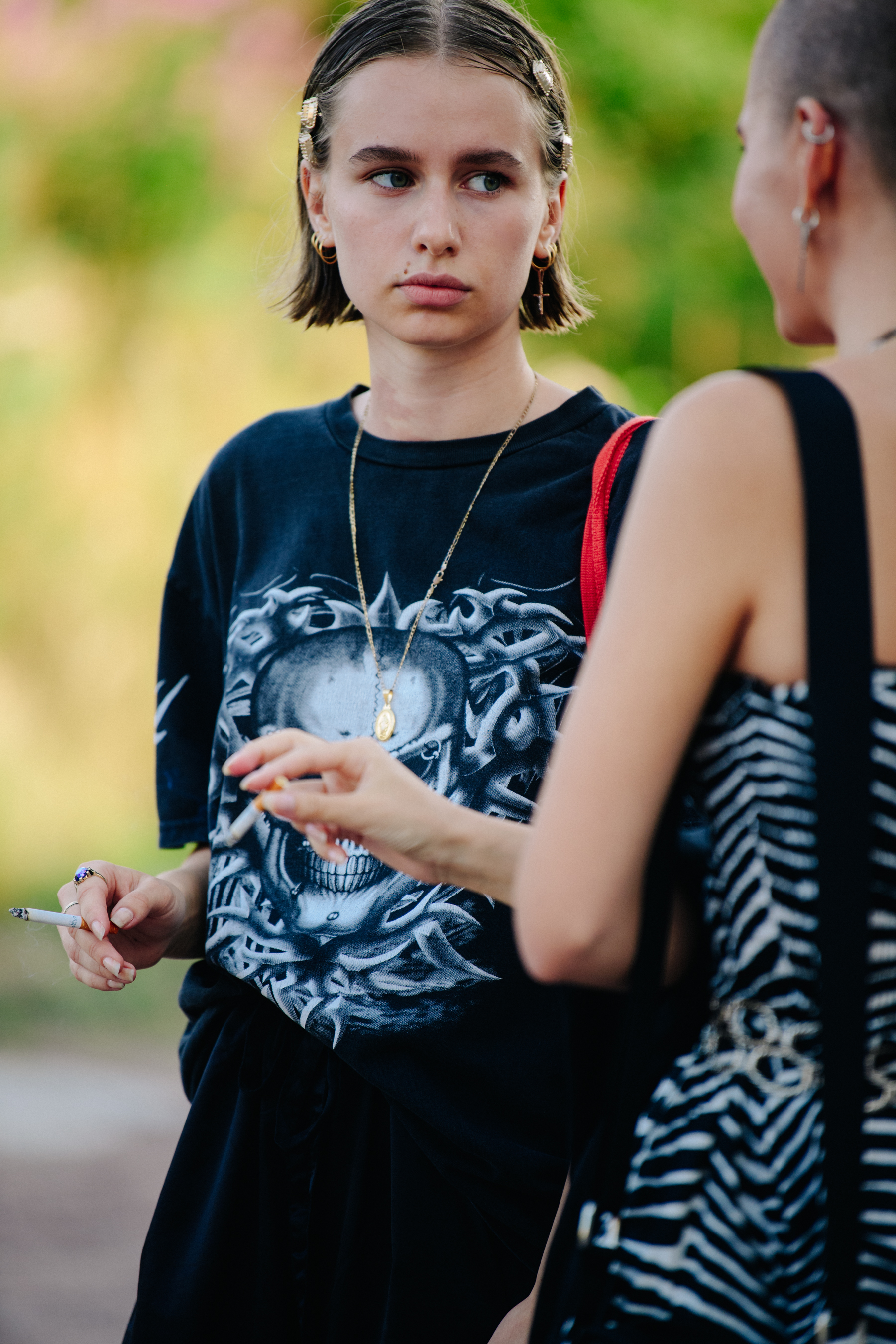 Model wearing skull tee shirt