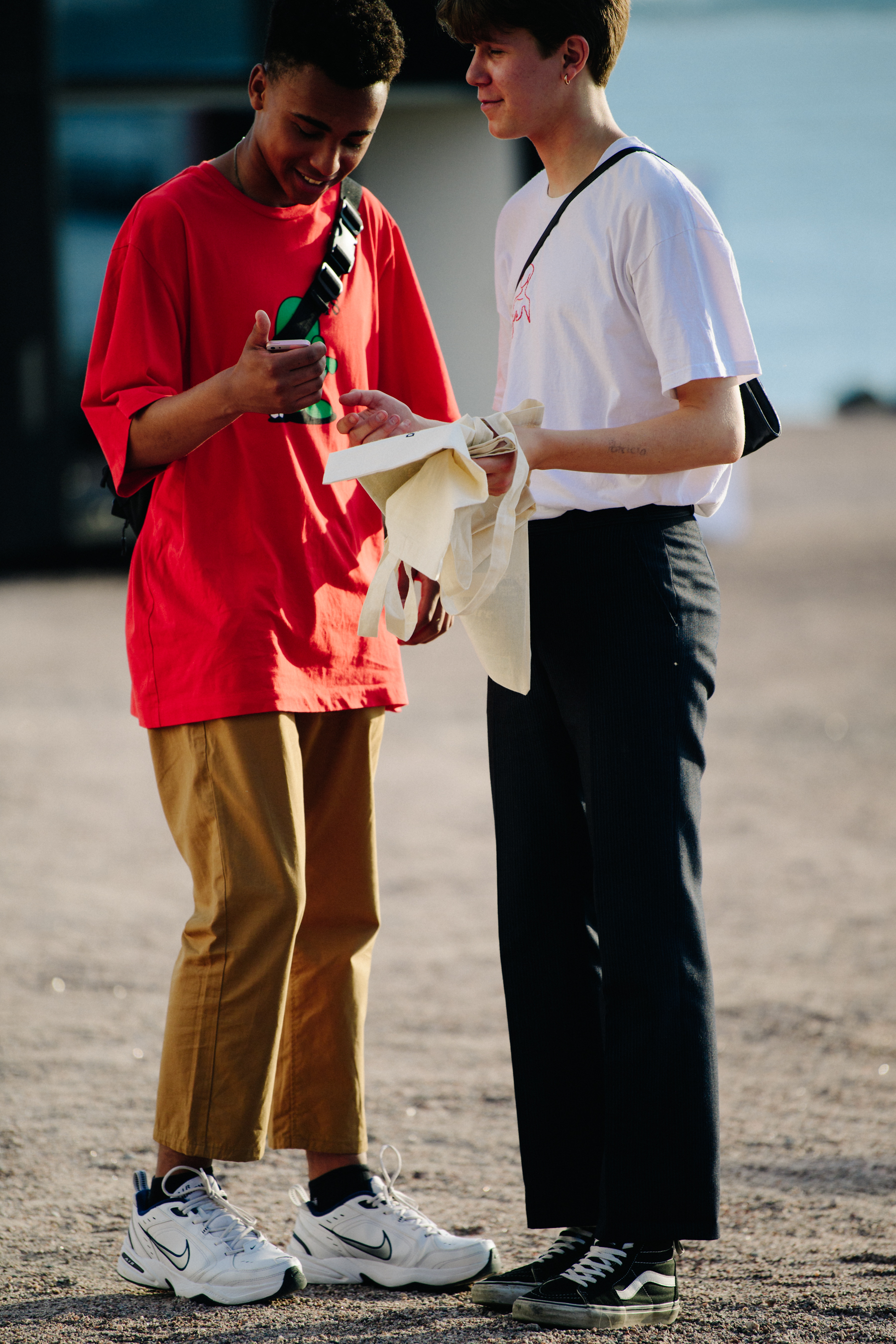 Two men wearing stylish outfits