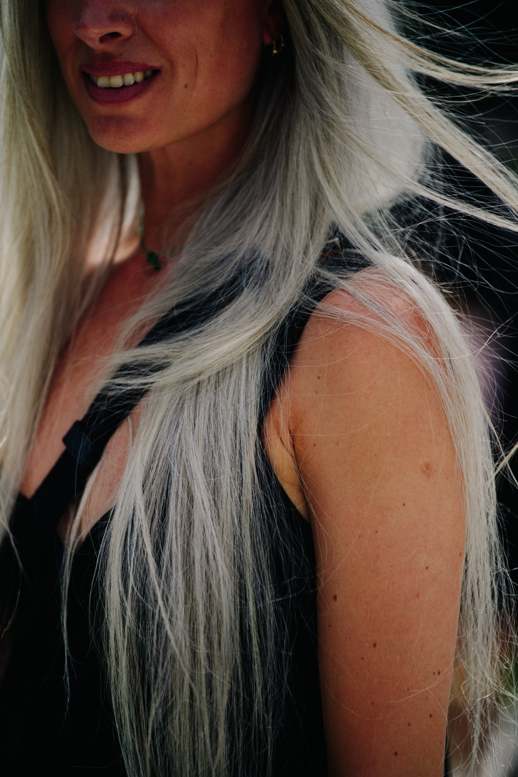 Editor with long silver hair
