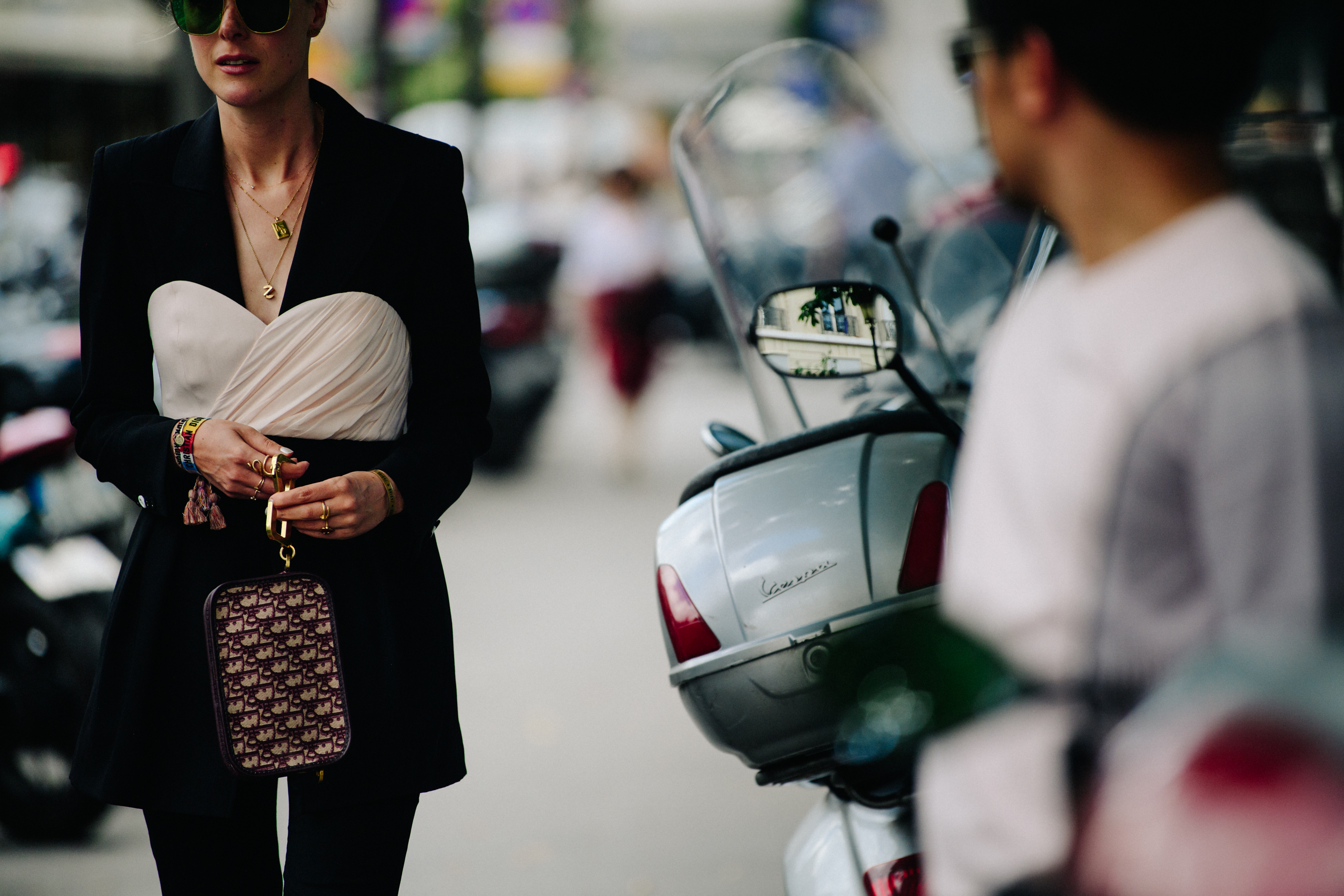 Woman carrying Christian Dior bag