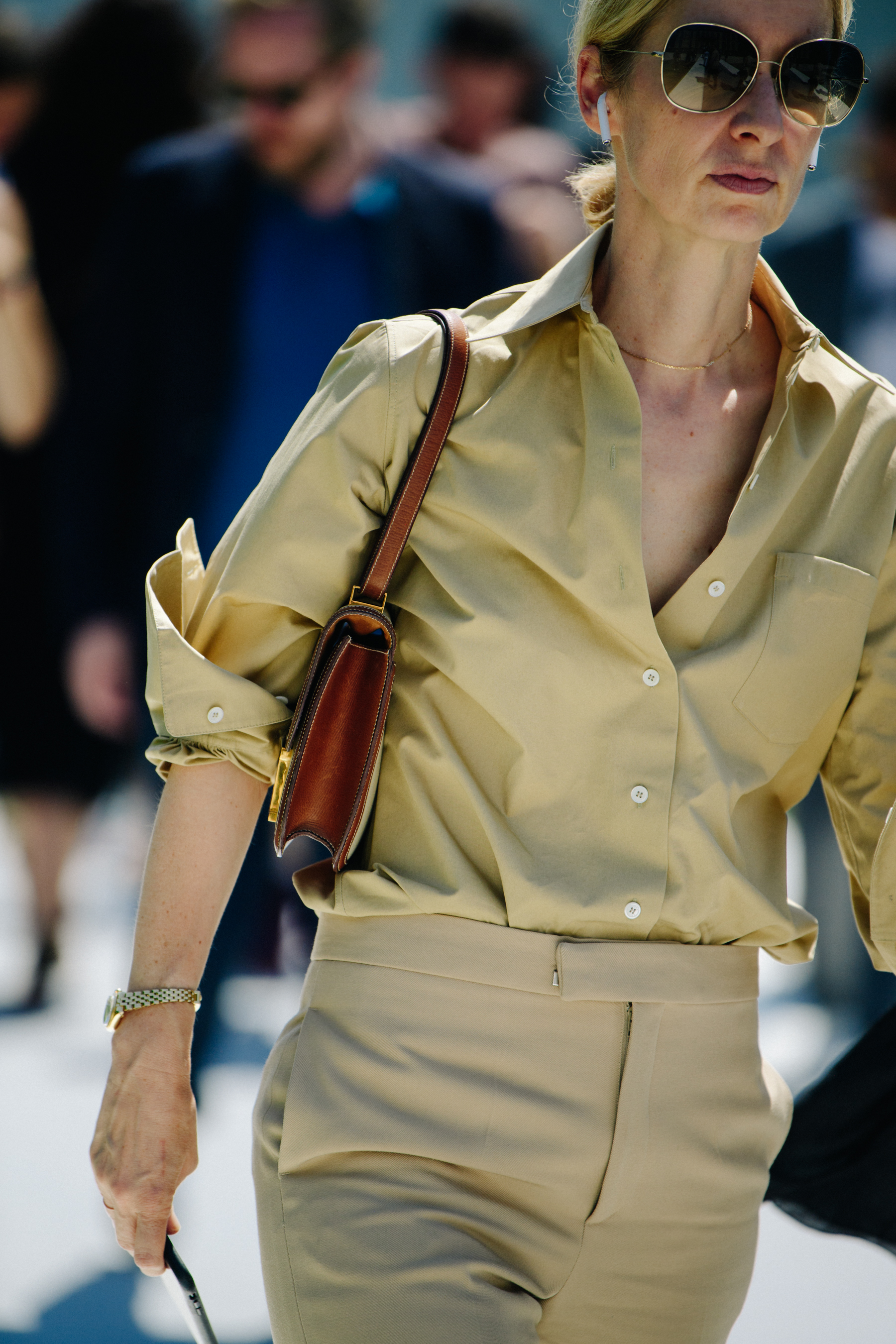 Woman wearing tan suit
