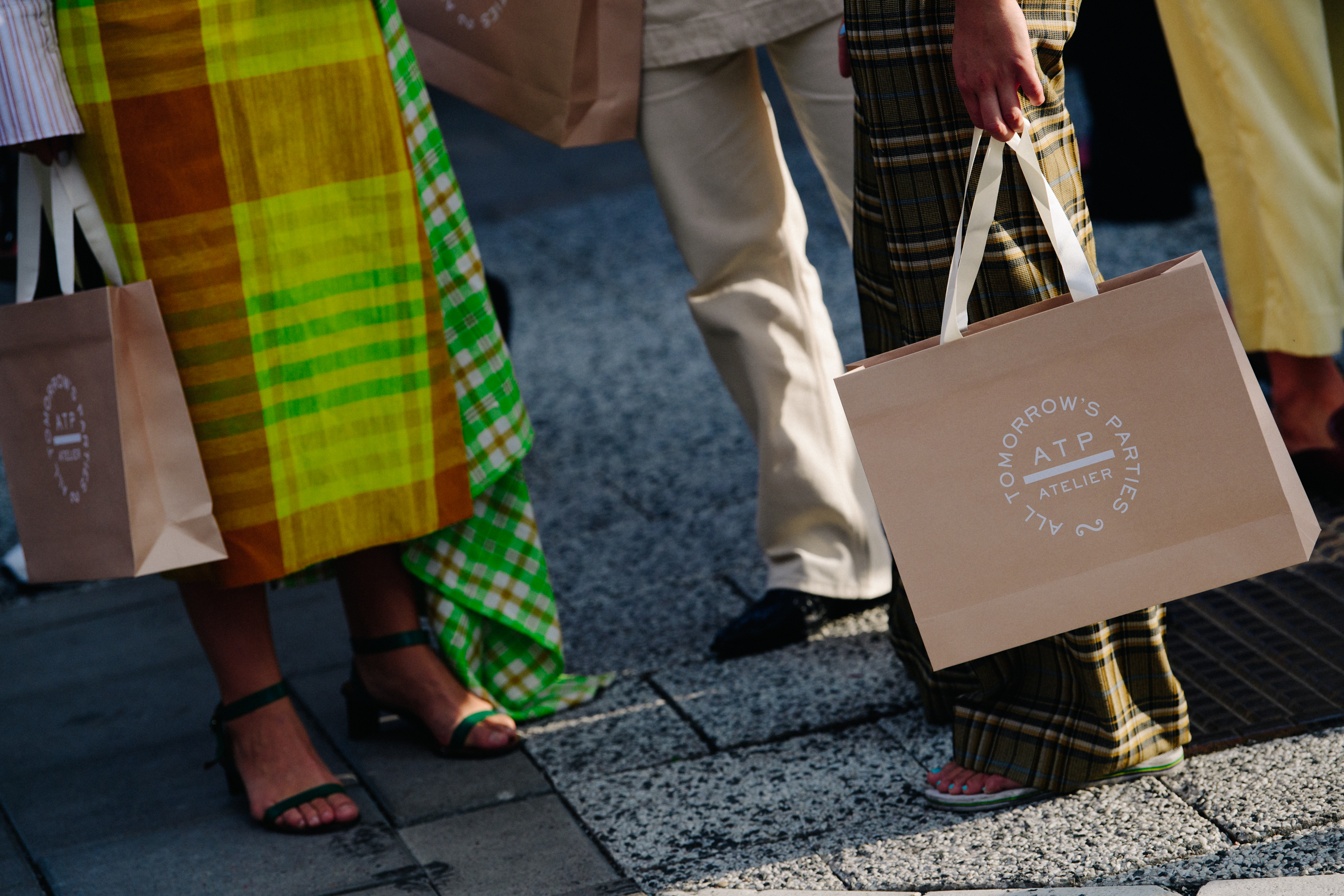 Woman carrying paper bags