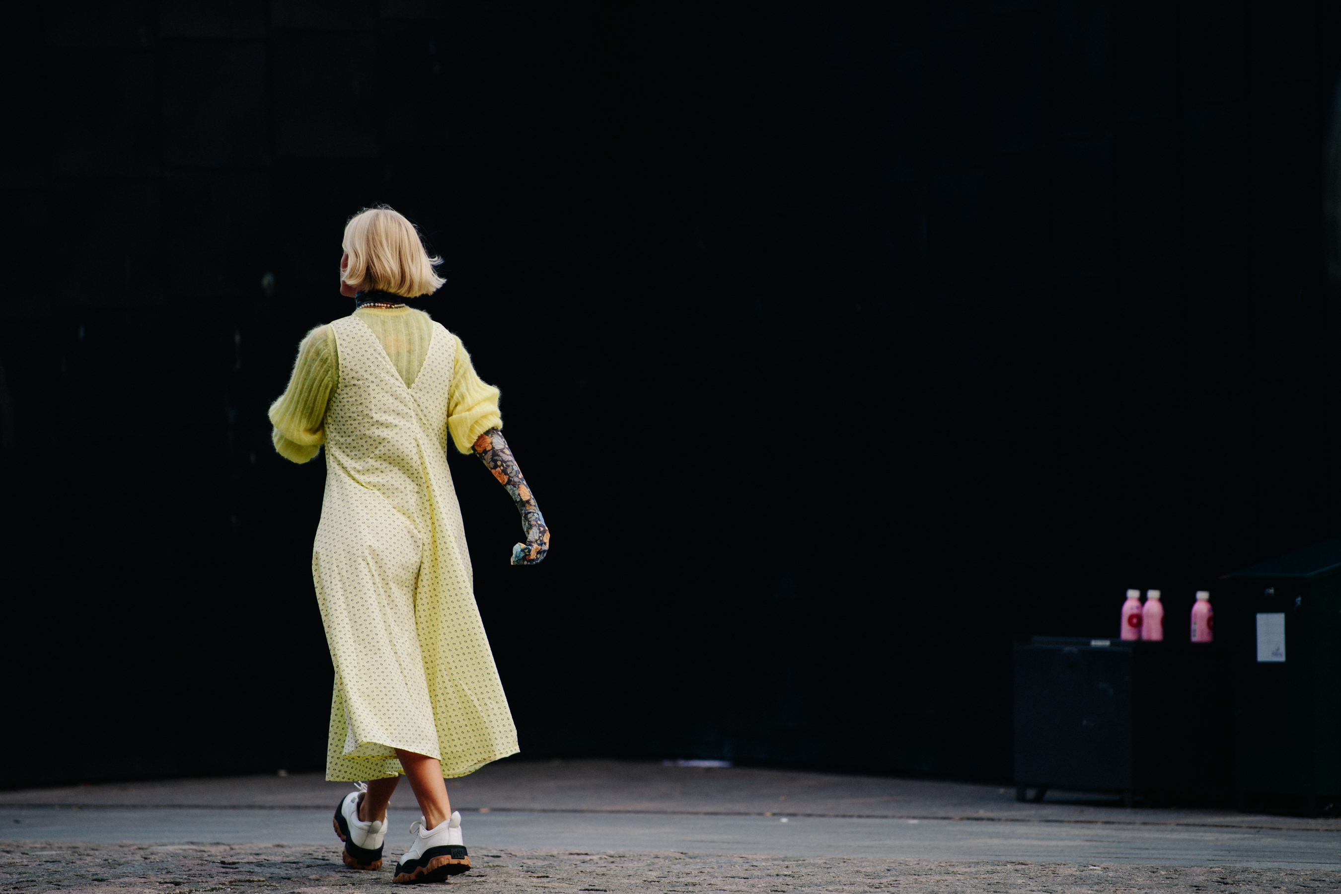 Woman wearing yellow outfit