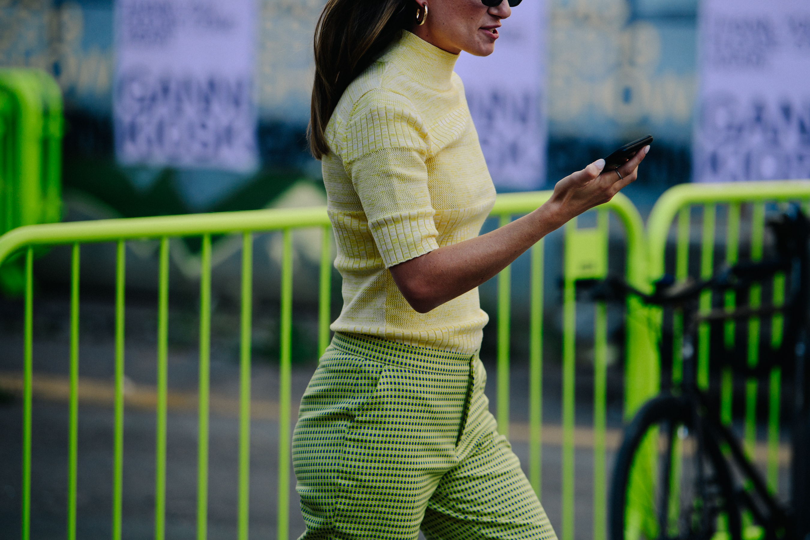 Woman wearing yellow and green outfit