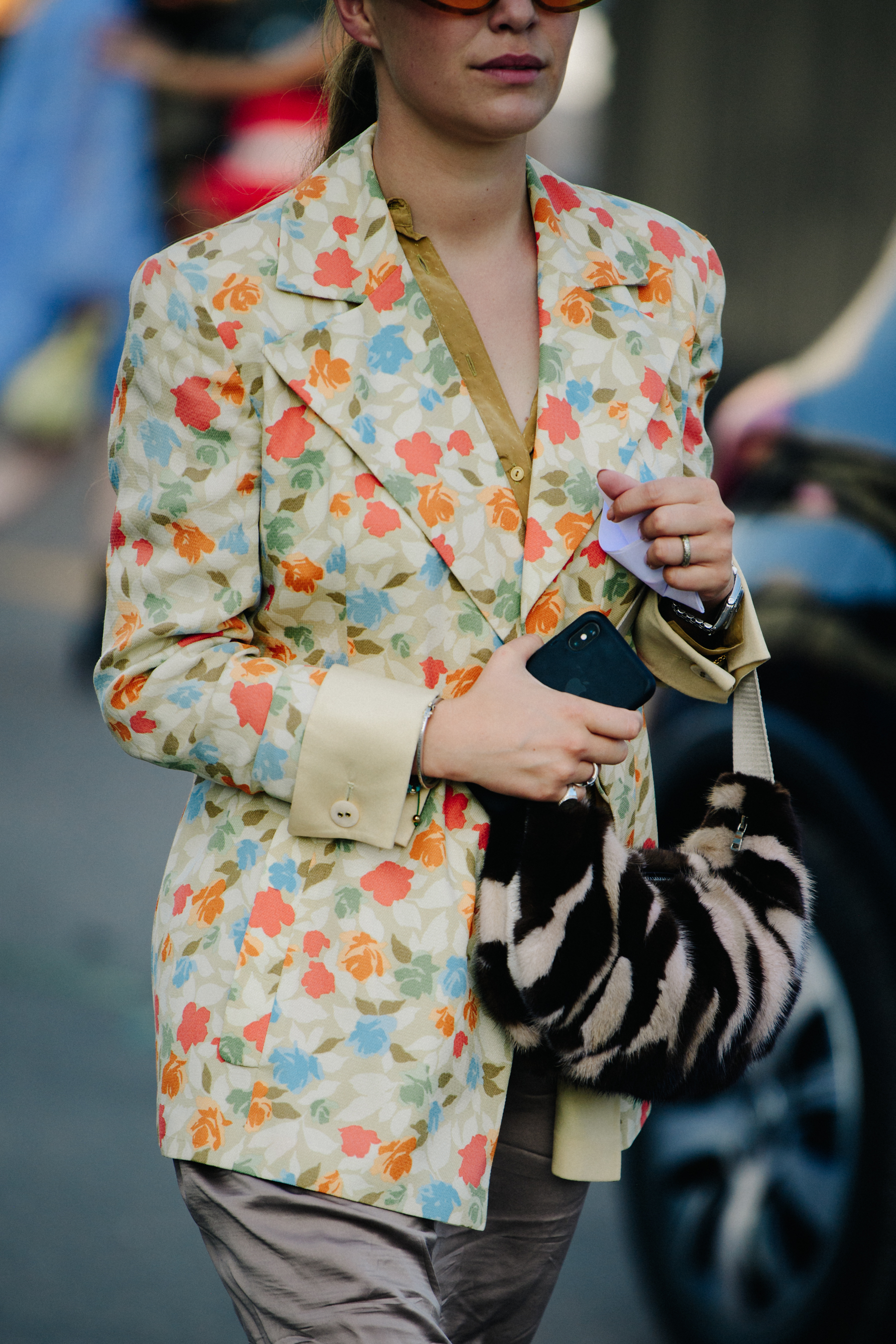 Woman wearing floral jacket