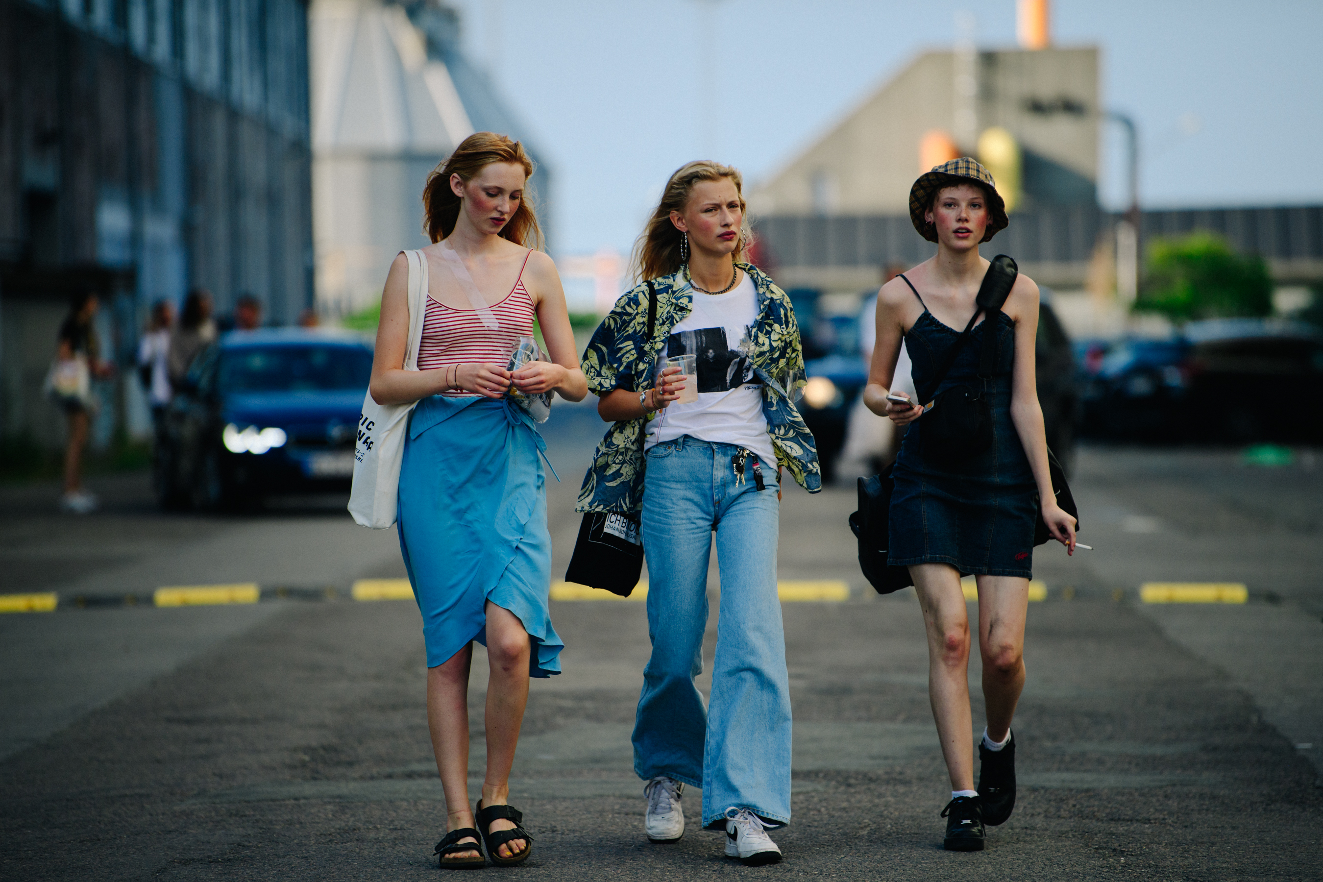 Three models wearing summer clothing