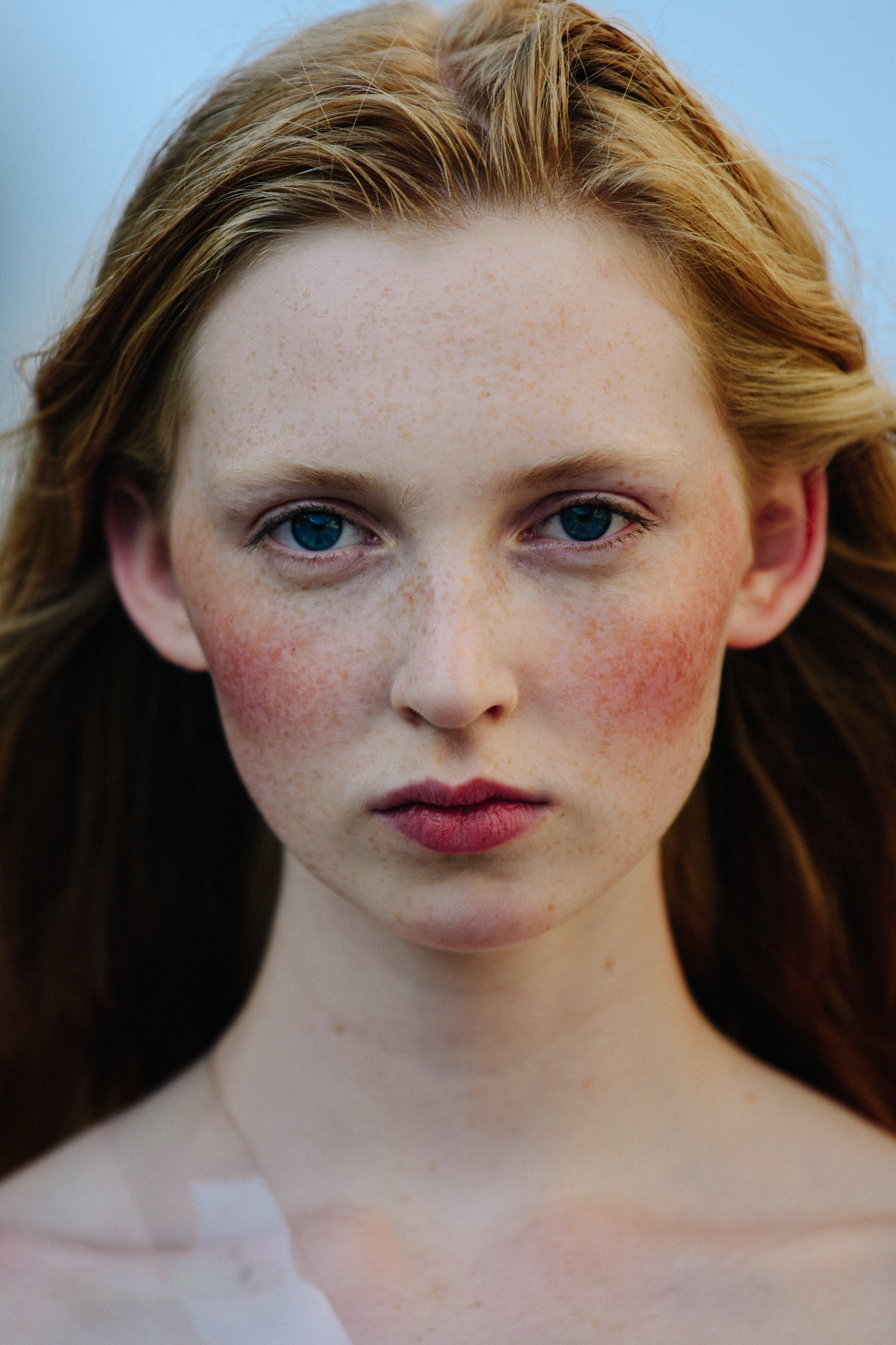 Portrait of model with long red hair