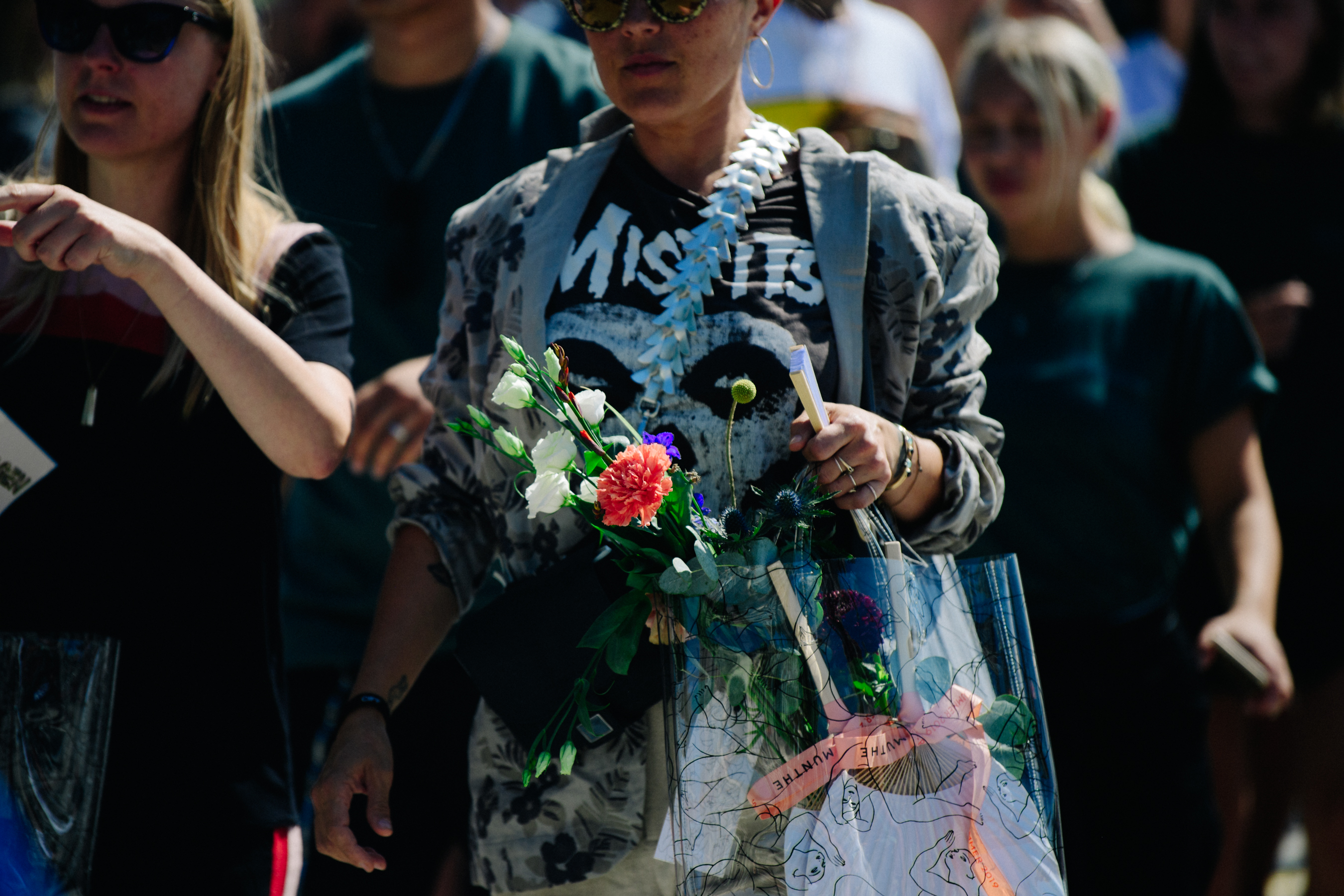 Woman carrying flowers