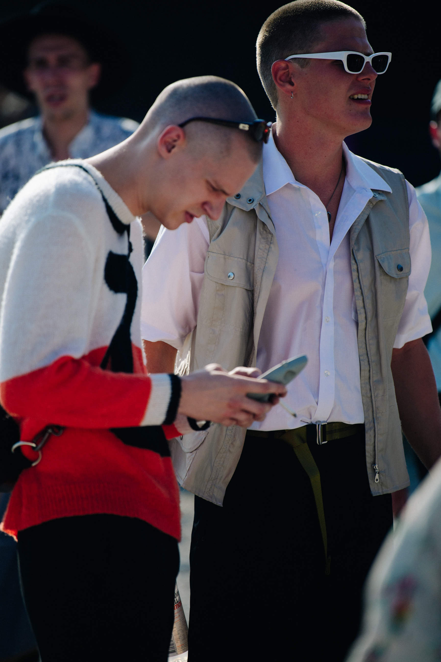 Two men wearing white