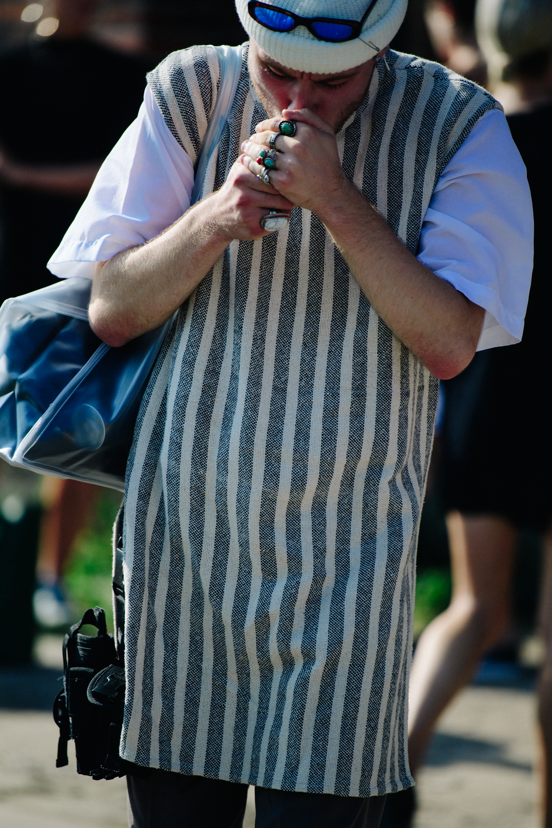 Man wearing striped vest
