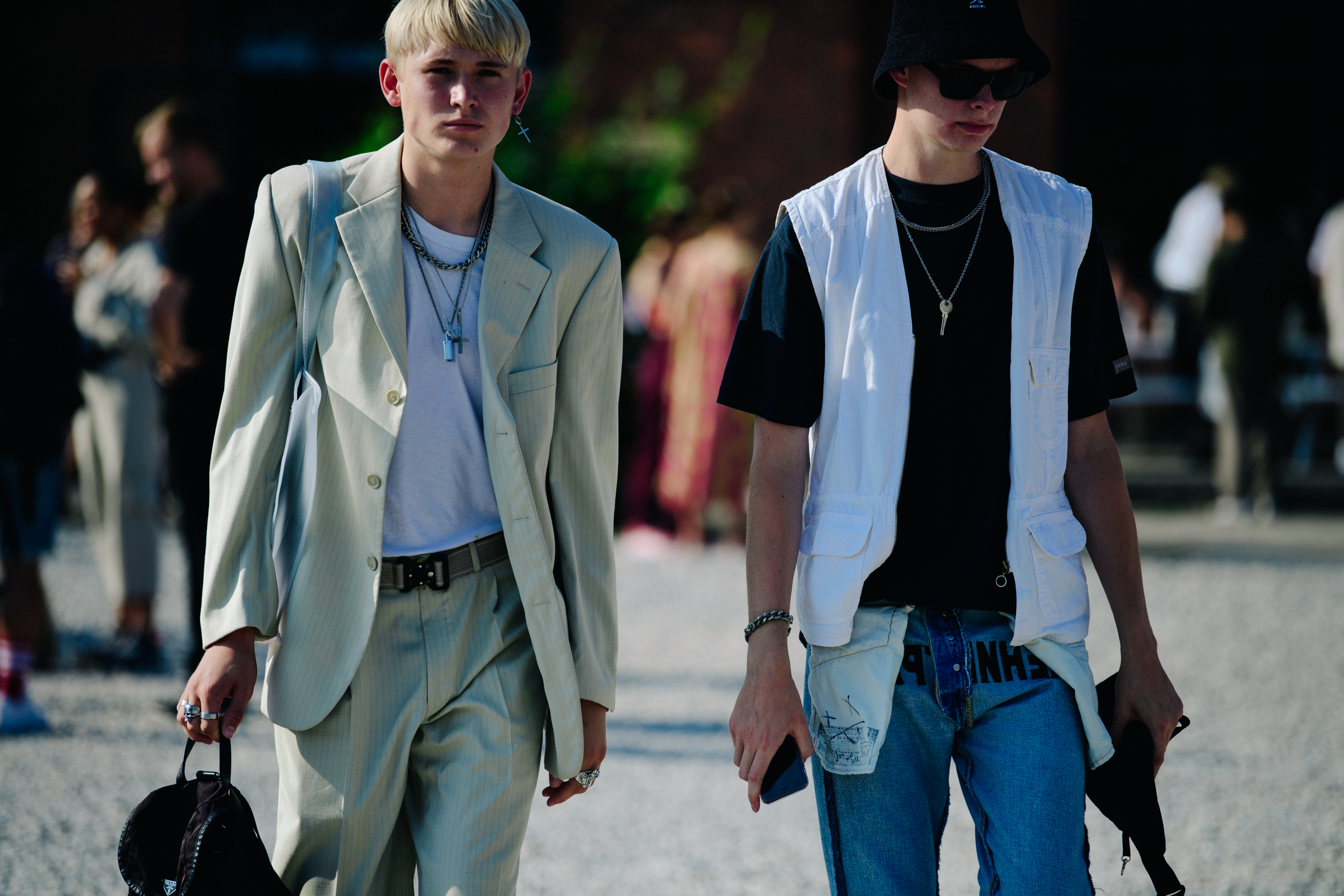 Two men wearing silver jewellery