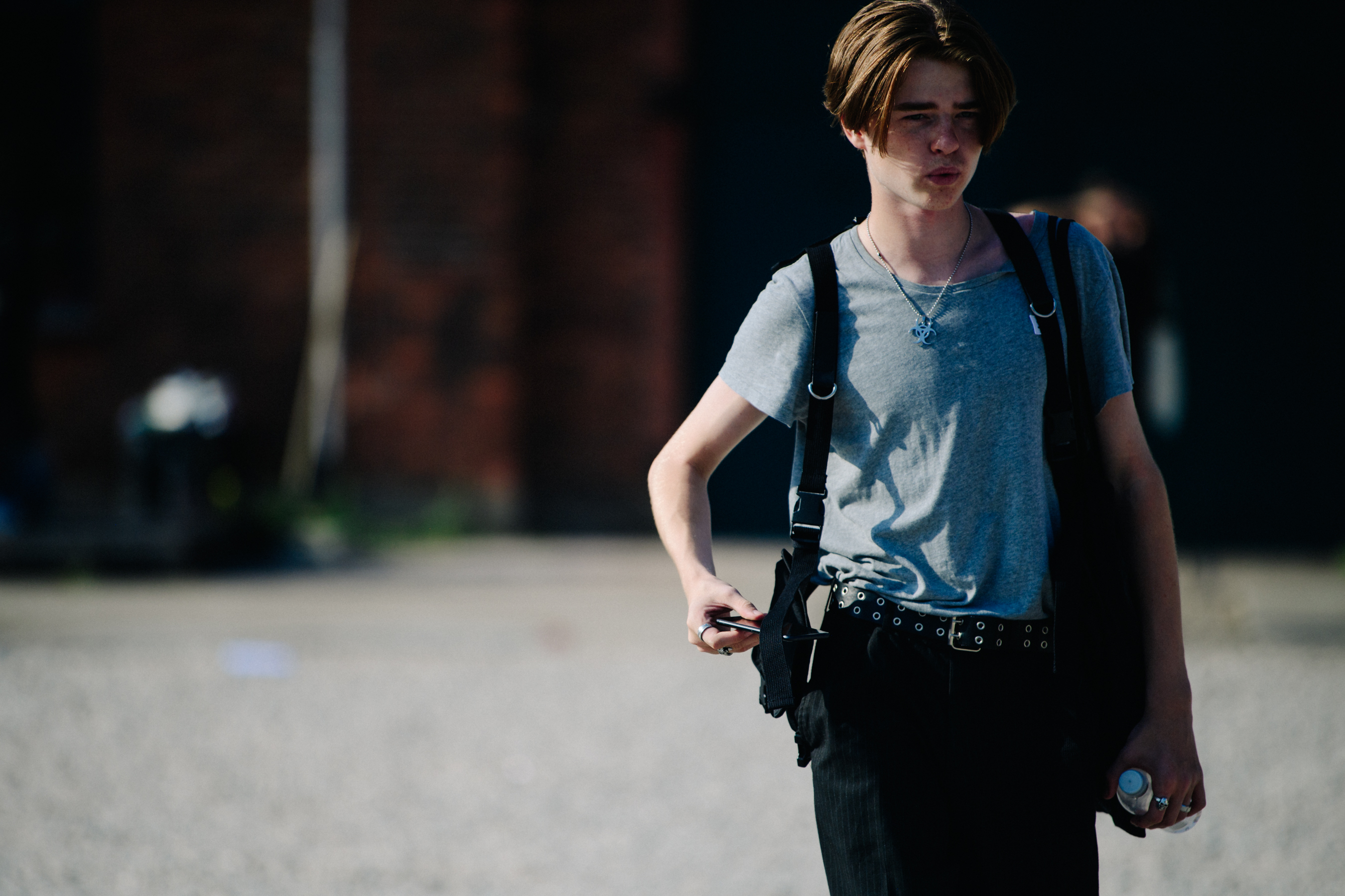 Man wearing grey tee shirt