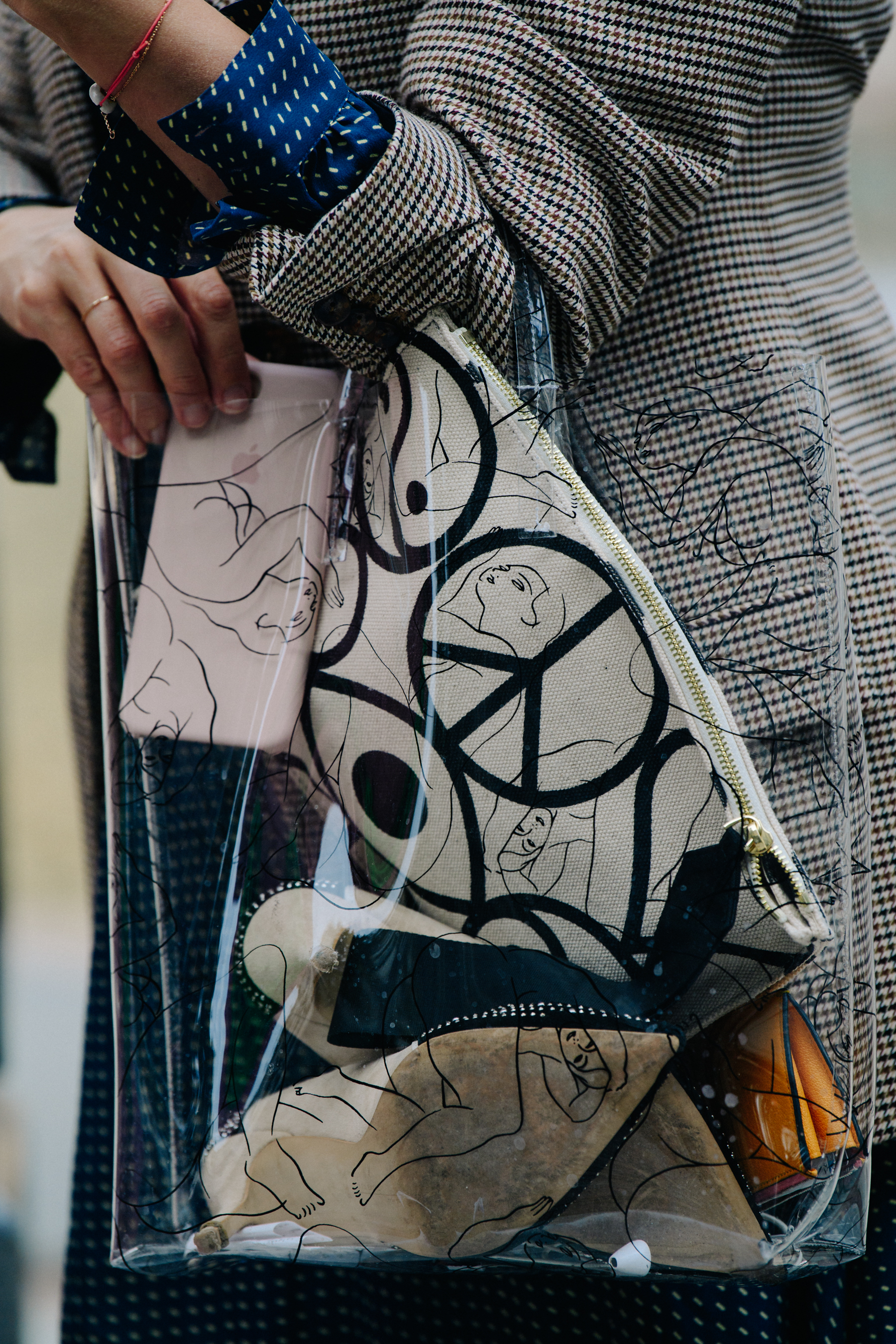 Woman carrying plastic bag