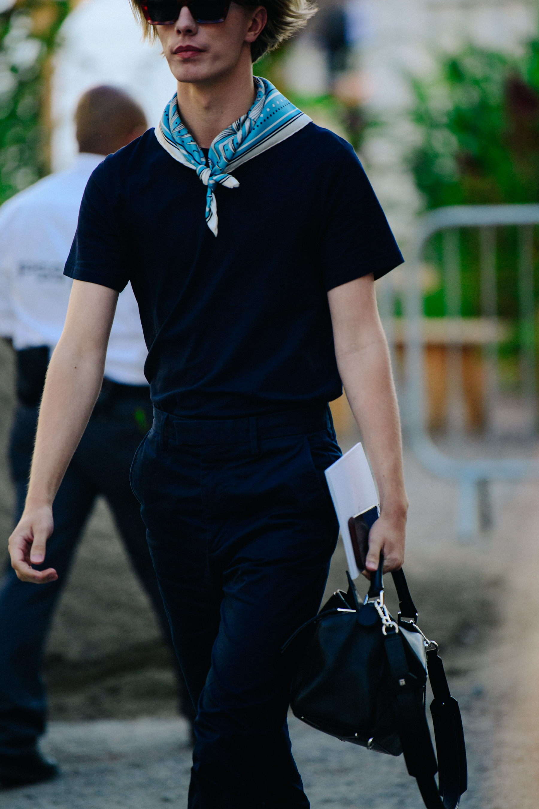Man wearing blue neckerchief