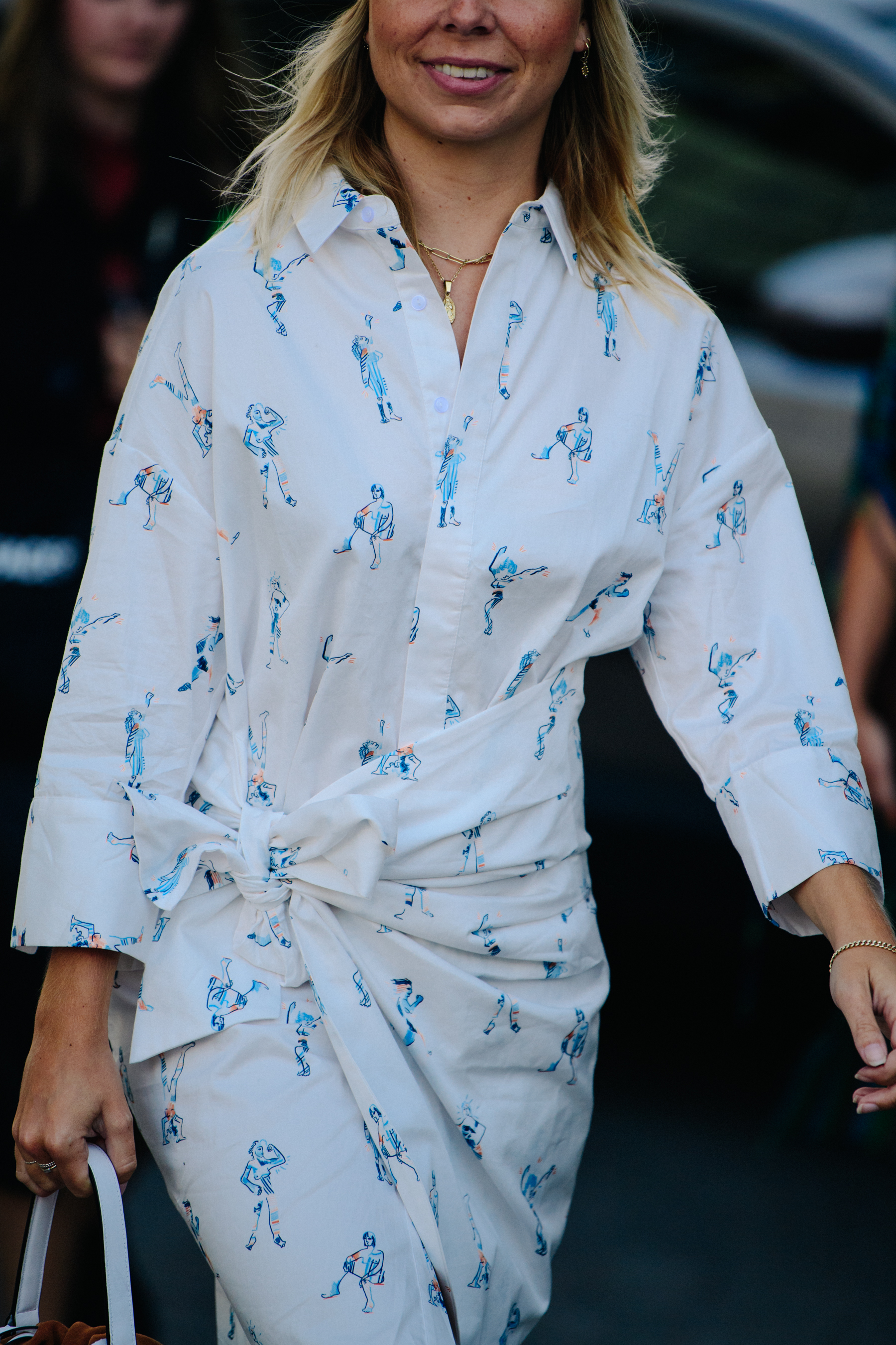 Woman wearing blue pattern dress