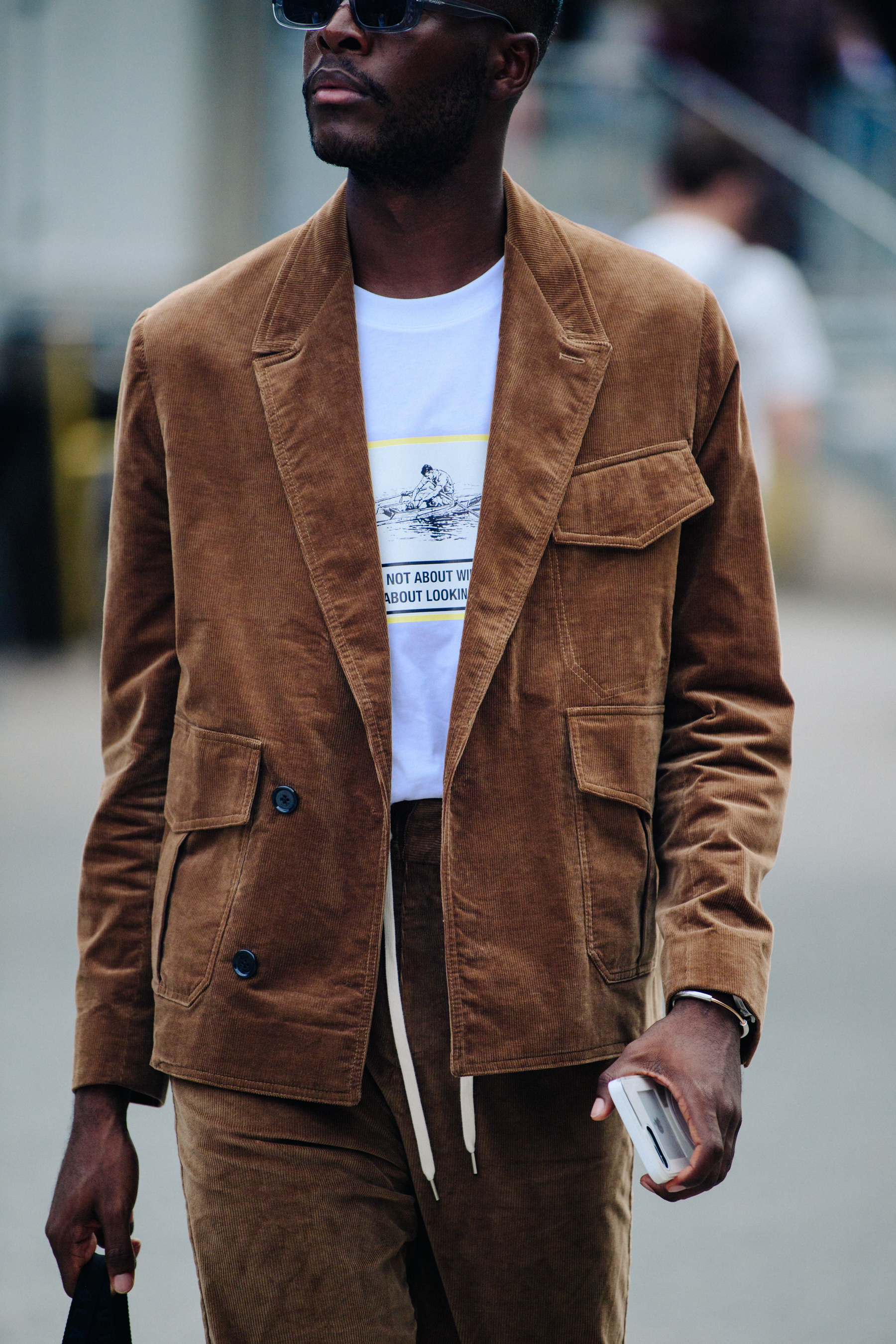 Man wearing brown outfit