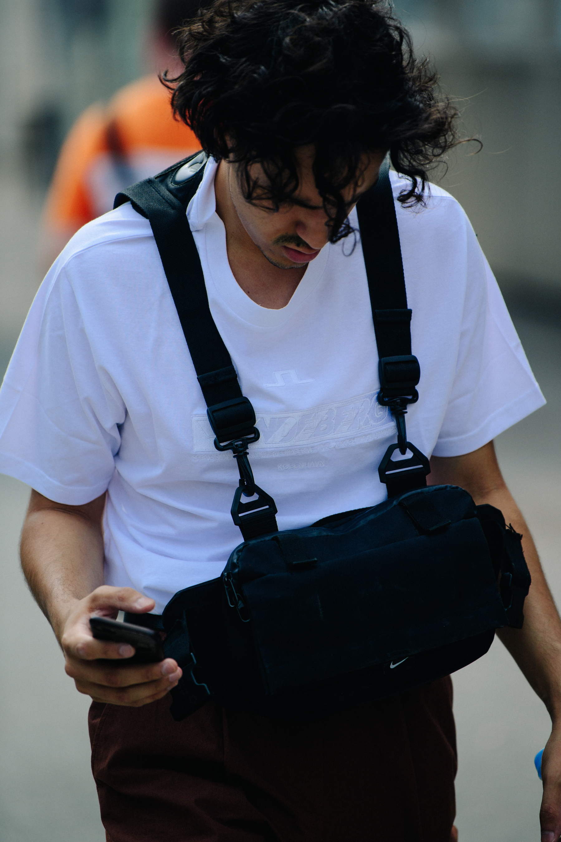 Man carrying black bag