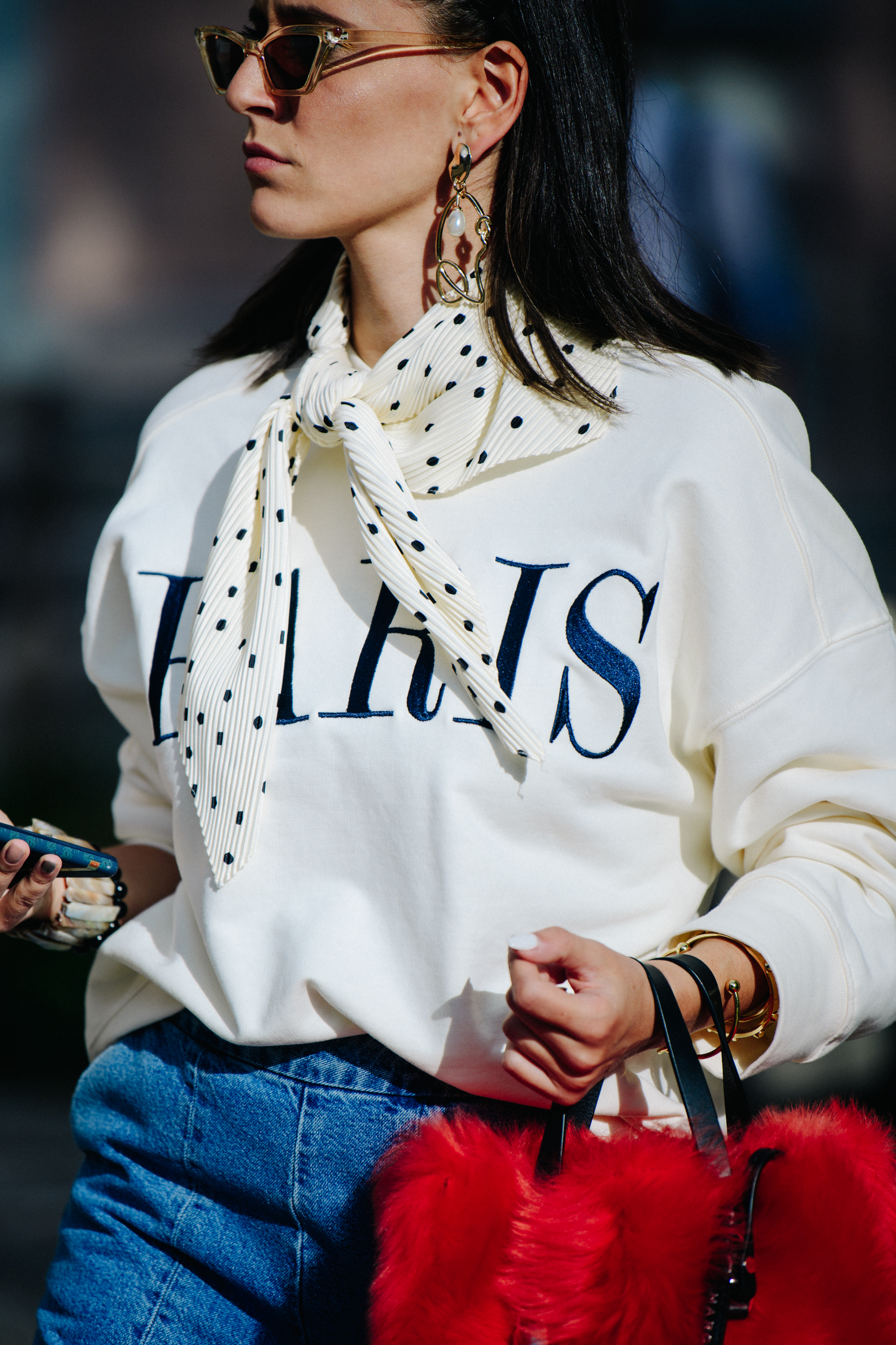 Woman wearing white jumper